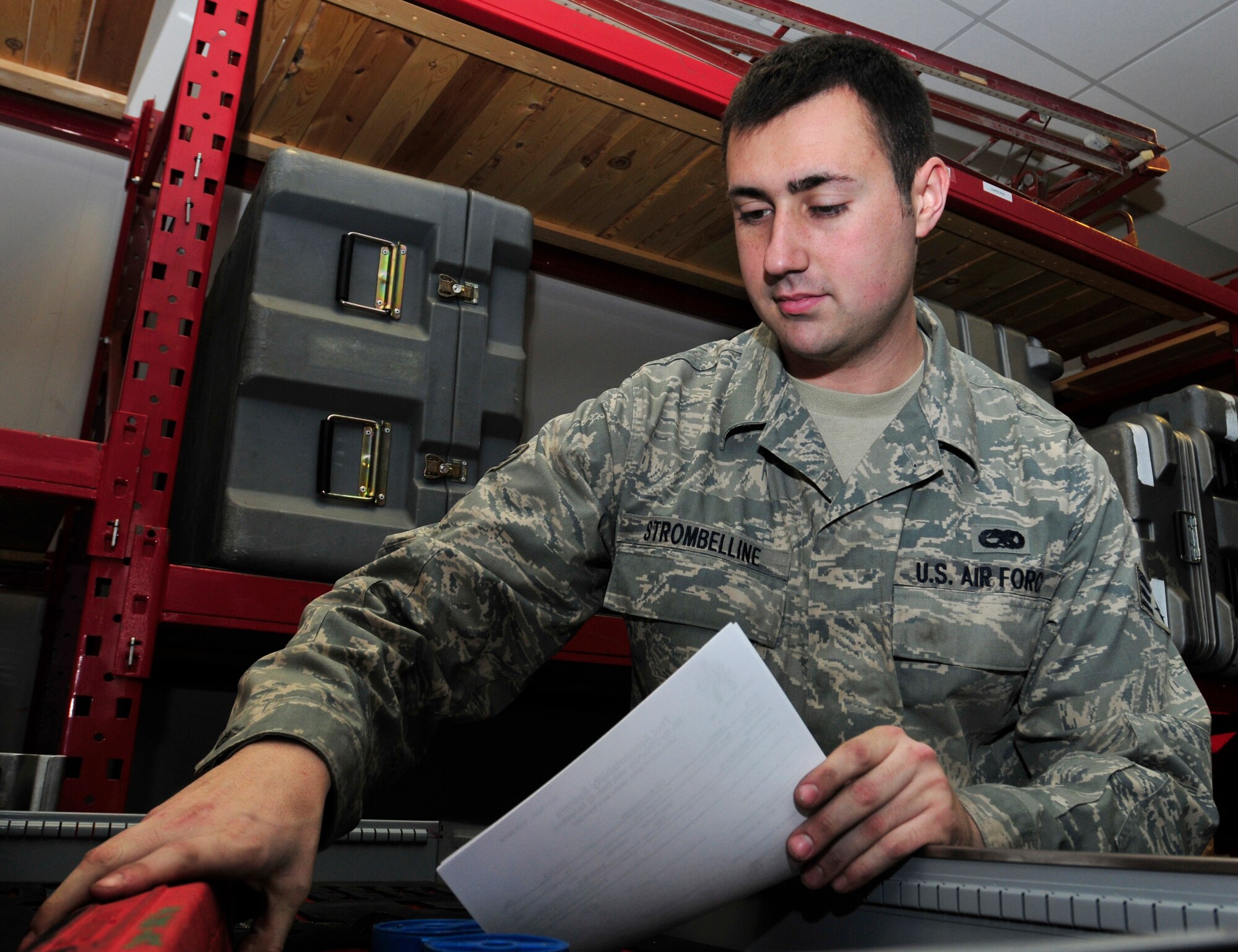 ROYAL AIR FORCE LAKENHEATH, England – Senior Airman Michael Strombelline, 48th Aircraft Maintenance Squadron support technician, inspects a tool box in the Support Section at the Strike Eagle Complex, Dec. 1, 2011. Strombelline contributed to the accomplishments which helped lead to Capt. William Bernecker, former 48th AMXS Officer in Charge, being awarded the Gen. Lew Allen Jr. Trophy. (U.S. Air Force photo by Senior Airman Tiffany M. Deuel)