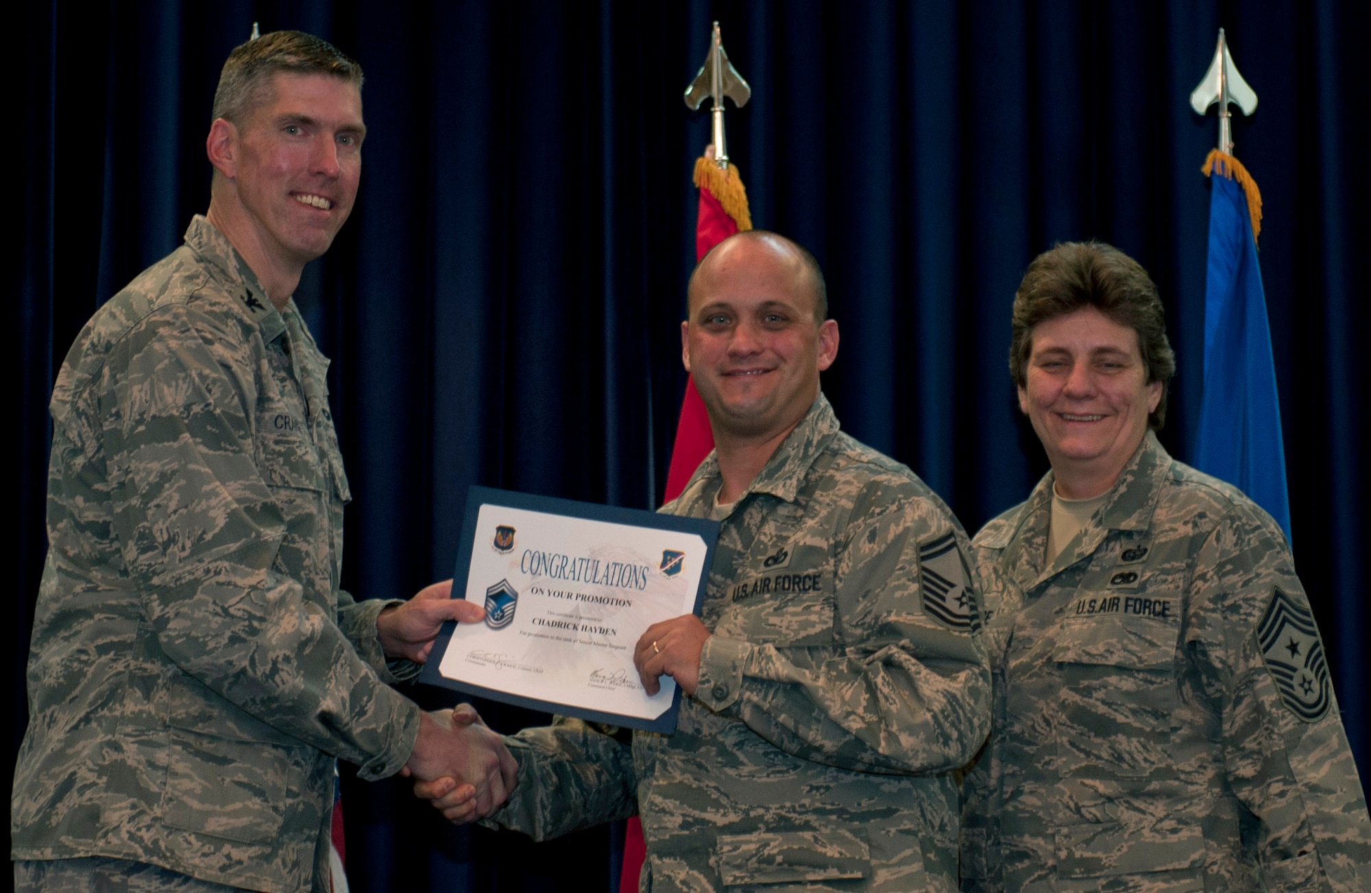 Chadrick Hayden, 39th Security Forces Squadron, is promoted to the rank of senior master sergeant Nov. 30, 2011, in the Club Complex ballroom at Incirlik Air Base, Turkey. (U.S. Air Force photo by Senior Airman Anthony Sanchelli/Released)