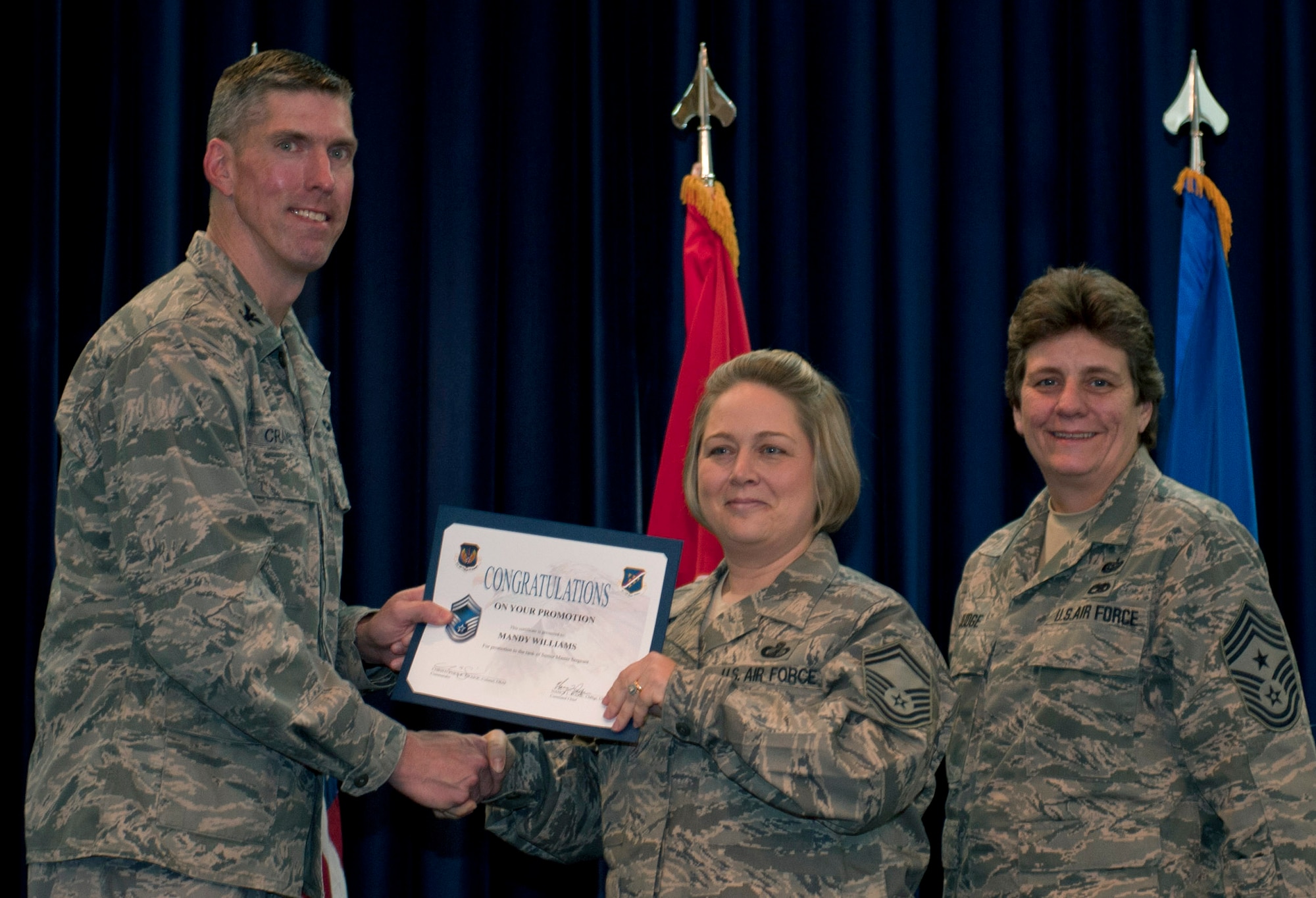 Mandy Williams, 39th Comptroller Squadron, is promoted to the rank of senior master sergeant Nov. 30, 2011, in the Club Complex ballroom at Incirlik Air Base, Turkey. (U.S. Air Force photo by Senior Airman Anthony Sanchelli/Released)
