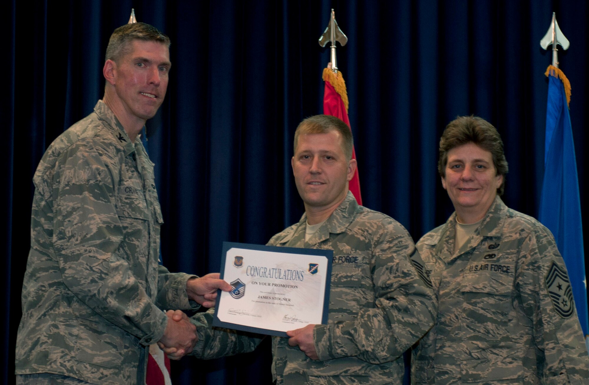James Stogner, 728th Air Mobility Squadron, is promoted to the rank of master sergeant Nov. 30, 2011, in the Club Complex ballroom at Incirlik Air Base, Turkey. (U.S. Air Force photo by Senior Airman Anthony Sanchelli/Released)