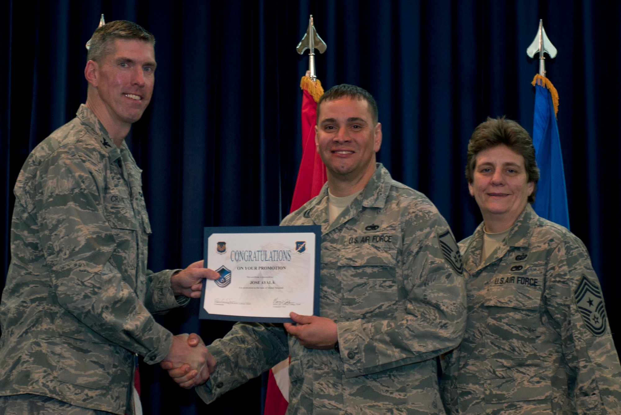 Jose Ayala, 728th Air Mobility Squadron, is promoted to the rank of master sergeant Nov. 30, 2011, in the Club Complex ballroom at Incirlik Air Base, Turkey. (U.S. Air Force photo by Senior Airman Anthony Sanchelli/Released)