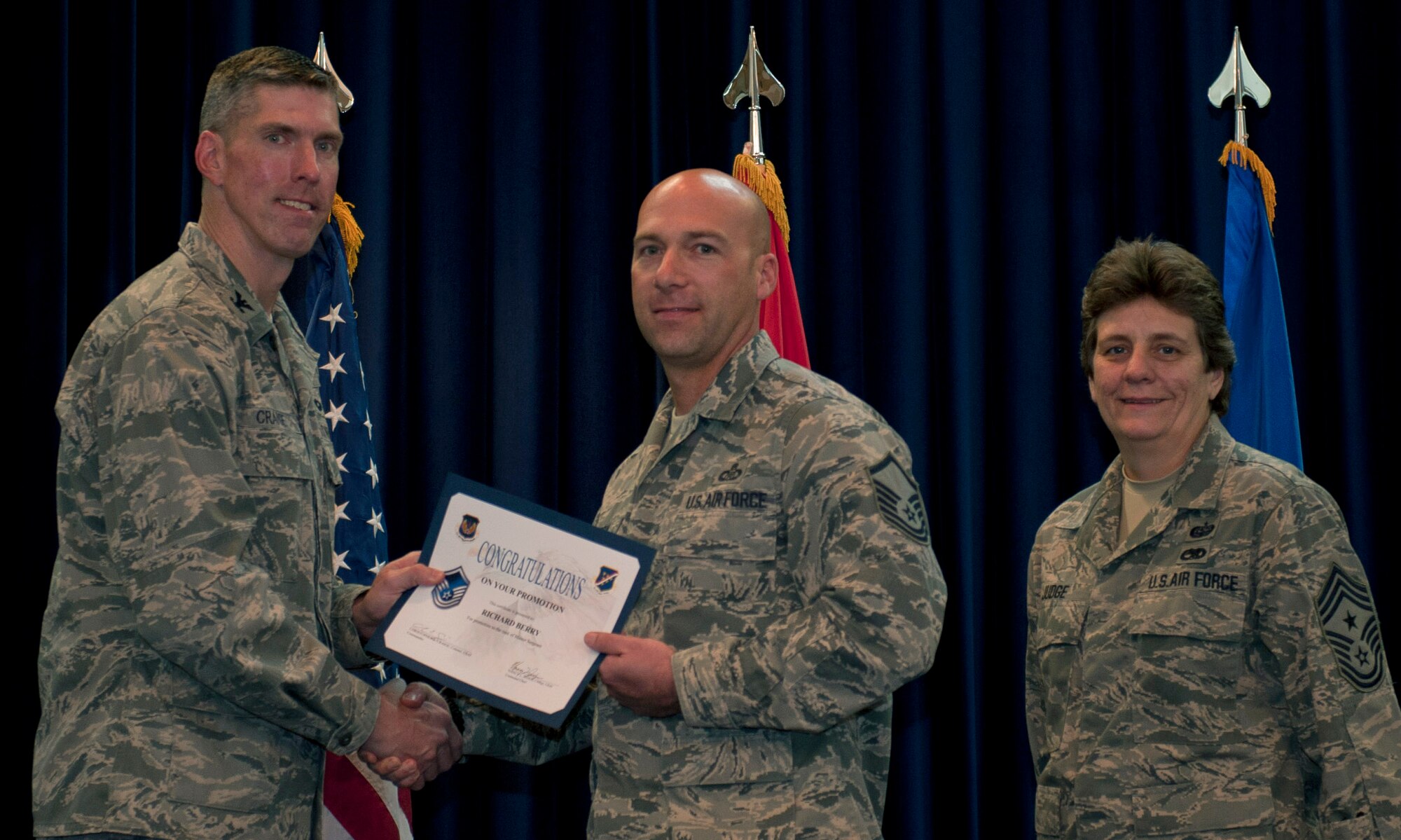 Richard Berry, 39th Operations Squadron, is promoted to the rank of master sergeant Nov. 30, 2011, in the Club Complex ballroom at Incirlik Air Base, Turkey. (U.S. Air Force photo by Senior Airman Anthony Sanchelli/Released)