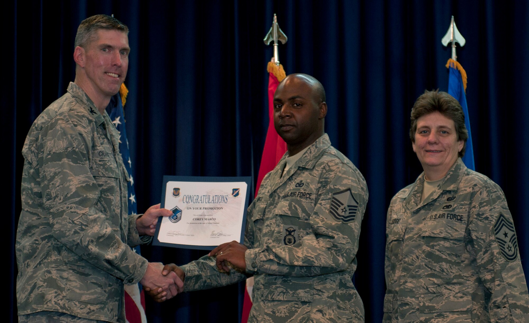 Corey Marco, 39th Security Forces Squadron, is promoted to the rank of master sergeant Nov. 30, 2011, in the Club Complex ballroom at Incirlik Air Base, Turkey. (U.S. Air Force photo by Senior Airman Anthony Sanchelli/Released)