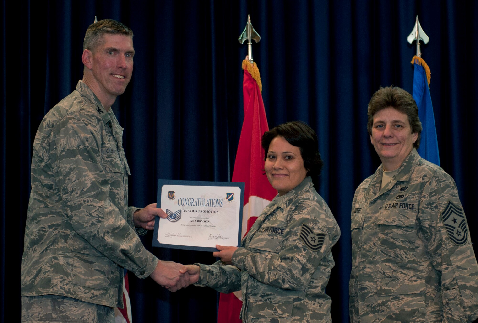 Ana Bryson, 39th Logistics Readiness Squadron, is promoted to the rank of technical sergeant Nov. 30, 2011, in the Club Complex ballroom at Incirlik Air Base, Turkey. (U.S. Air Force photo by Senior Airman Anthony Sanchelli/Released)