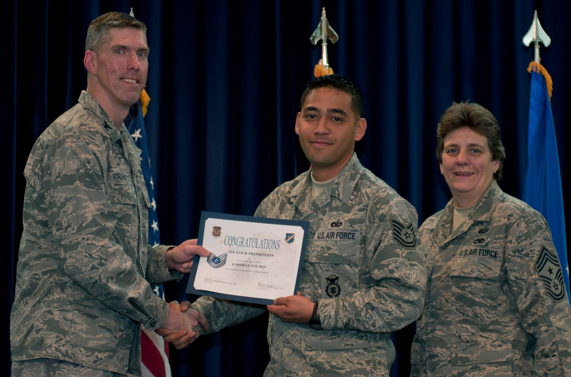 Lordell Wilson, 39th Security Forces Squadron, is promoted to the rank of technical sergeant Nov. 30, 2011, in the Club Complex ballroom at Incirlik Air Base, Turkey. (U.S. Air Force photo by Senior Airman Anthony Sanchelli/Released)