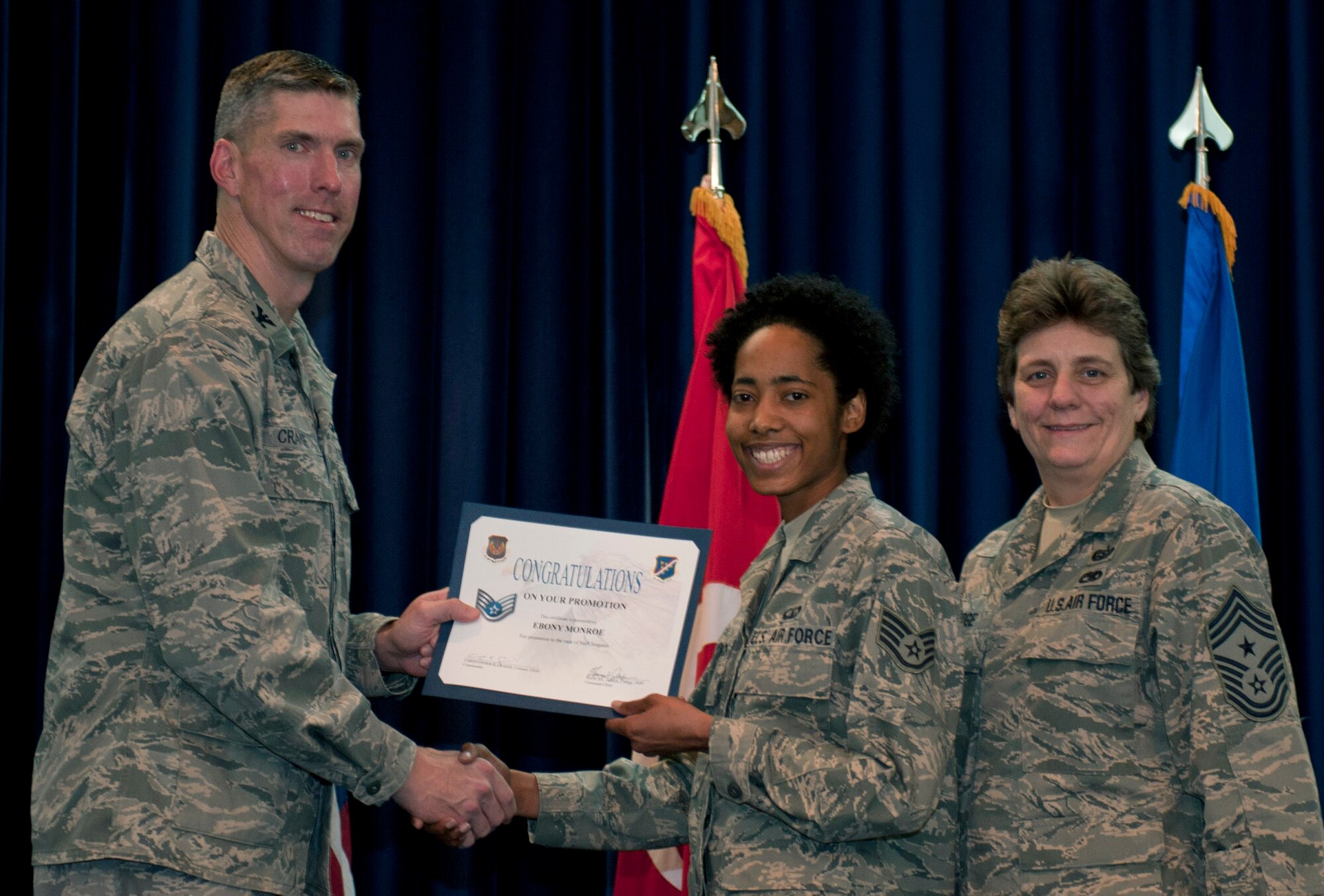 Ebony Monroe, 39th Operations Squadron, is promoted to the rank of staff sergeant Nov. 30, 2011, in the Club Complex ballroom at Incirlik Air Base, Turkey. (U.S. Air Force photo by Senior Airman Anthony Sanchelli/Released)