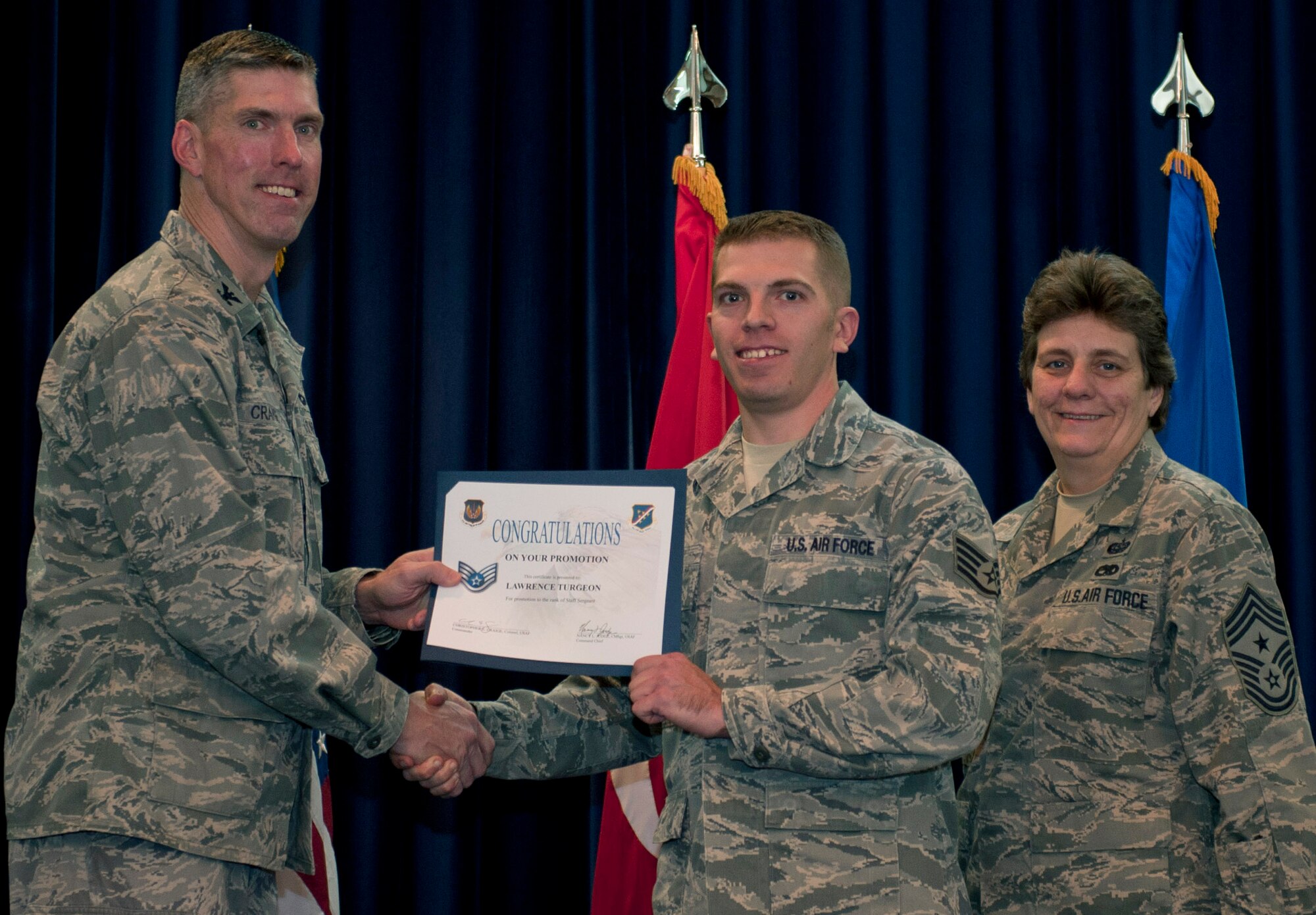 Lawrence Turgeon, 39th Communications Squadron, is promoted to the rank of staff sergeant Nov. 30, 2011, in the Club Complex ballroom at Incirlik Air Base, Turkey. (U.S. Air Force photo by Senior Airman Anthony Sanchelli/Released)