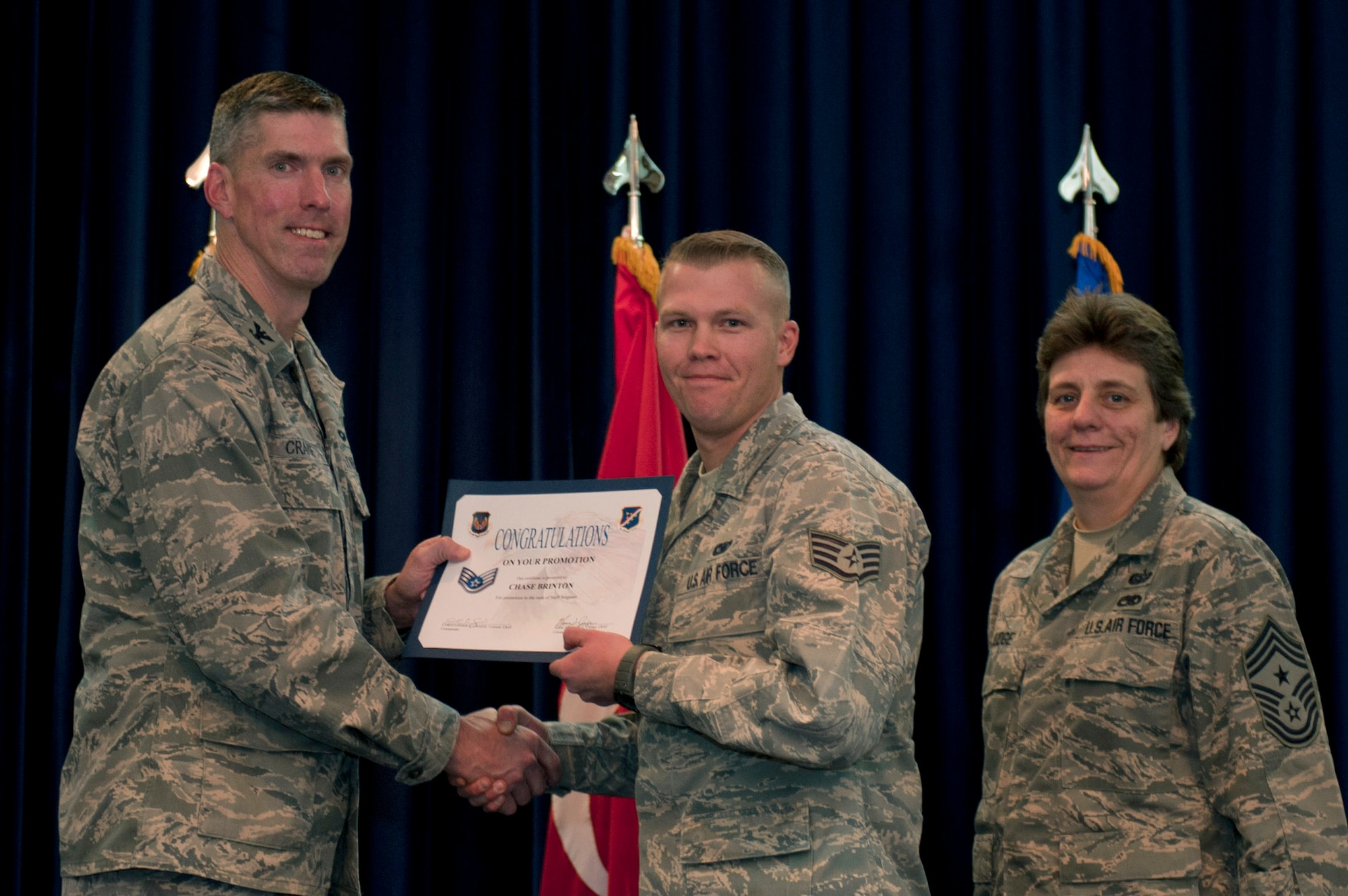 Chase Brinton, 39th Security Forces Squadron, is promoted to the rank of staff sergeant Nov. 30, 2011, in the Club Complex ballroom at Incirlik Air Base, Turkey. (U.S. Air Force photo by Senior Airman Anthony Sanchelli/Released)