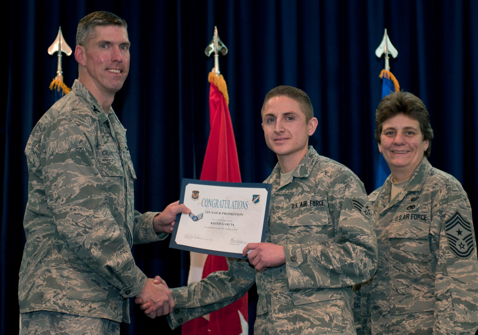Keith Garcia, 39th Logistics Readiness Squadron, is promoted to the rank of senior airman Nov. 30, 2011, in the Club Complex ballroom at Incirlik Air Base, Turkey. (U.S. Air Force photo by Senior Airman Anthony Sanchelli/Released)