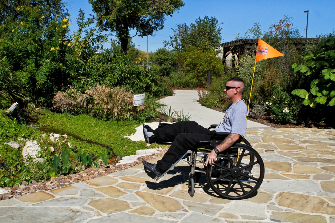 Army Cpl. Ian Stauffer, who is recovering from injuries he suffered in Afghanistan, frequently lingers in a landscaped area with a waterfall and vegetation at the Warrior and Family Support Center in San Antonio, Nov. 10, 2011.