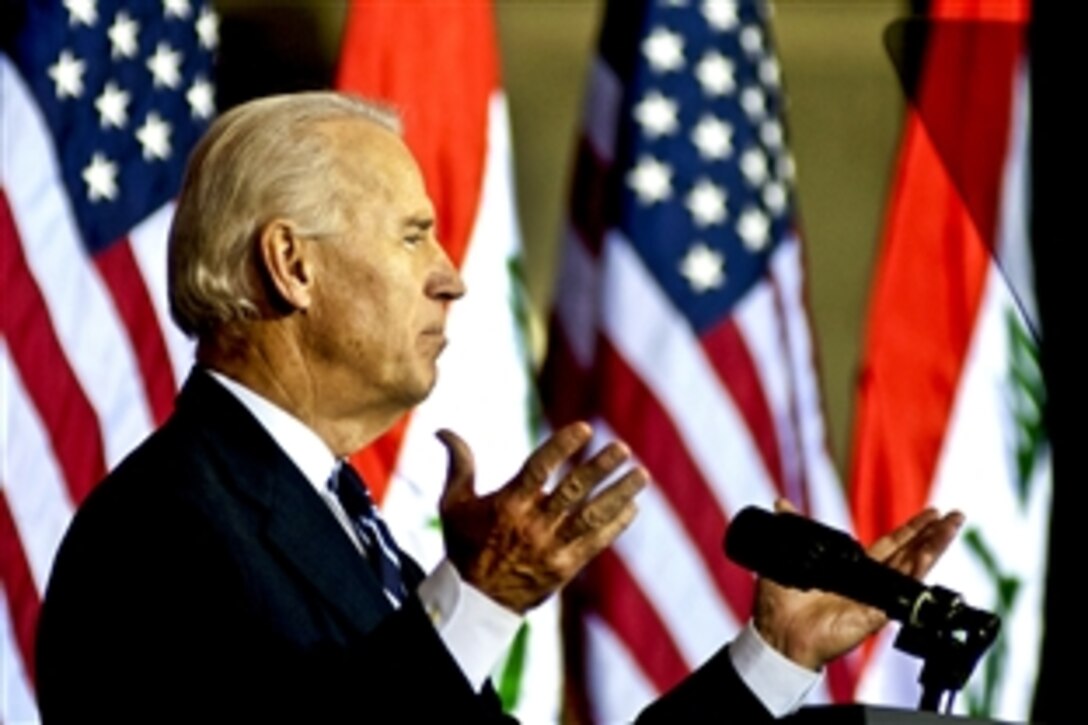 U.S. Vice President Joe Biden gives a speech during the Iraqi government's Day of Commitment ceremony in the Al Faw Palace on Victory Base Complex in Baghdad, Dec. 1, 2011. The ceremony commemorated the sacrifices and accomplishments of U.S. and Iraqi service members.