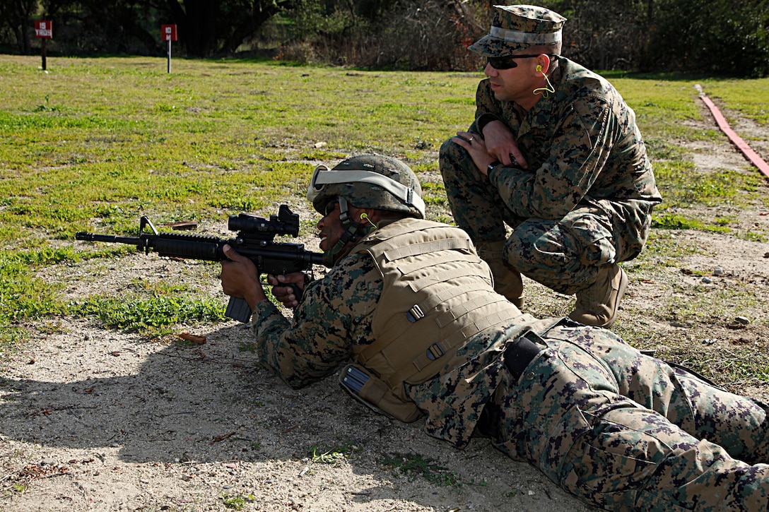 Sergeant Maj. John W. Scott, 15th Marine Expeditionary Unit Command Element sergeant major, sights in on a target at a battle sight zero exercise during Command Post Exercise II at Range 212A on Camp Pendleton, Dec. 1. The BZO is an adjustment made to the weapon’s optics that correctly aligns the weapon’s sight to the user. Command Post Exercise II focused on the unit’s ability to stand up an entire Command Operations Center quickly in the event the MEU is called to shore. Although the exercise included training for this specific event, CPEX II brought the Marines and sailors together by encouraging them to work as a team and build camaraderie among each other. Scott, 41, is a native of Carson, Calif.(U.S. Marine Corps photo by Lance Cpl. Danny L. Shaffer II)
