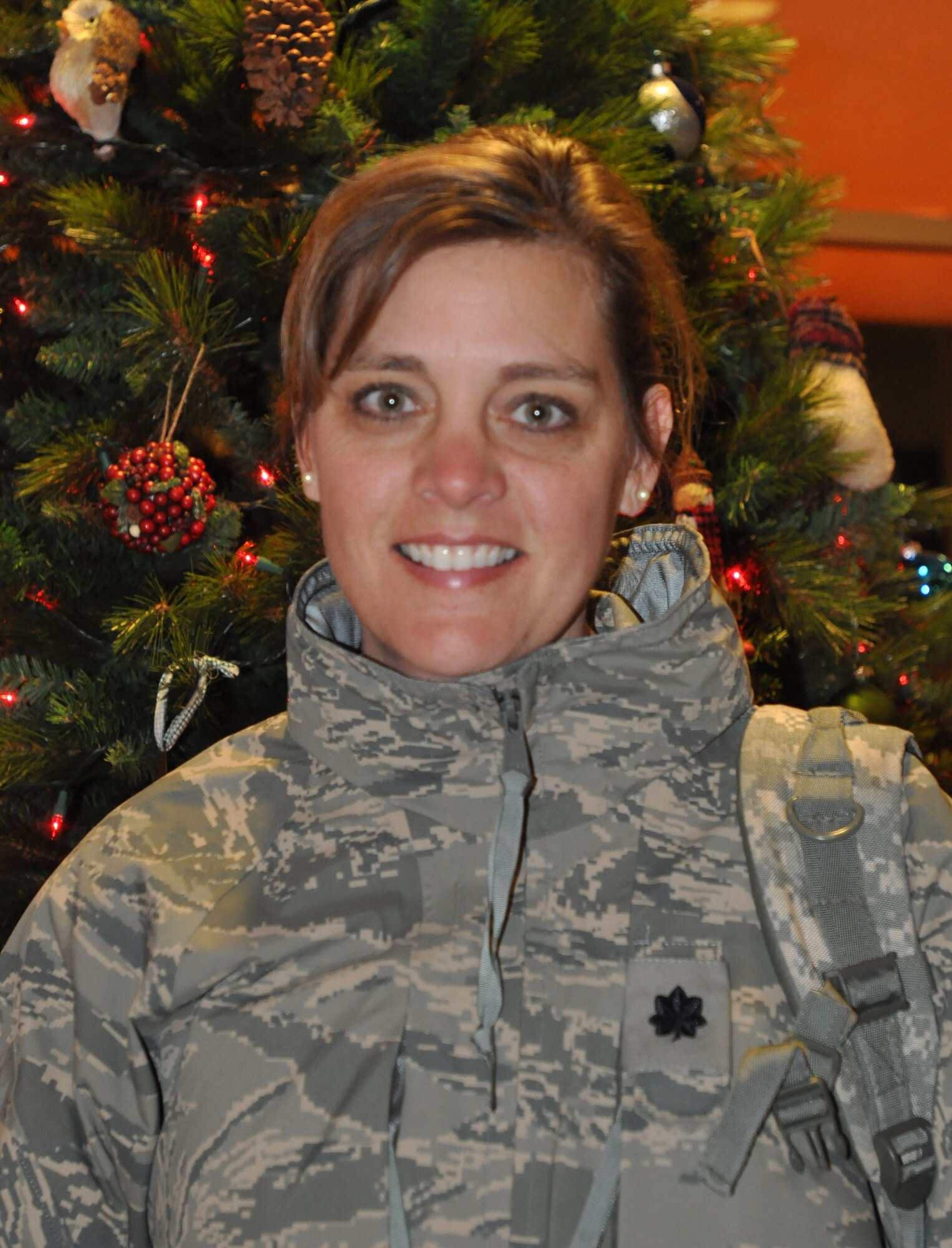 Lt. Col. Tracy Menahan. 934th ASTS, from Omaha Neb. "Cruising the Caribbean with the family, my favorite holiday song is Winter Wonderland."