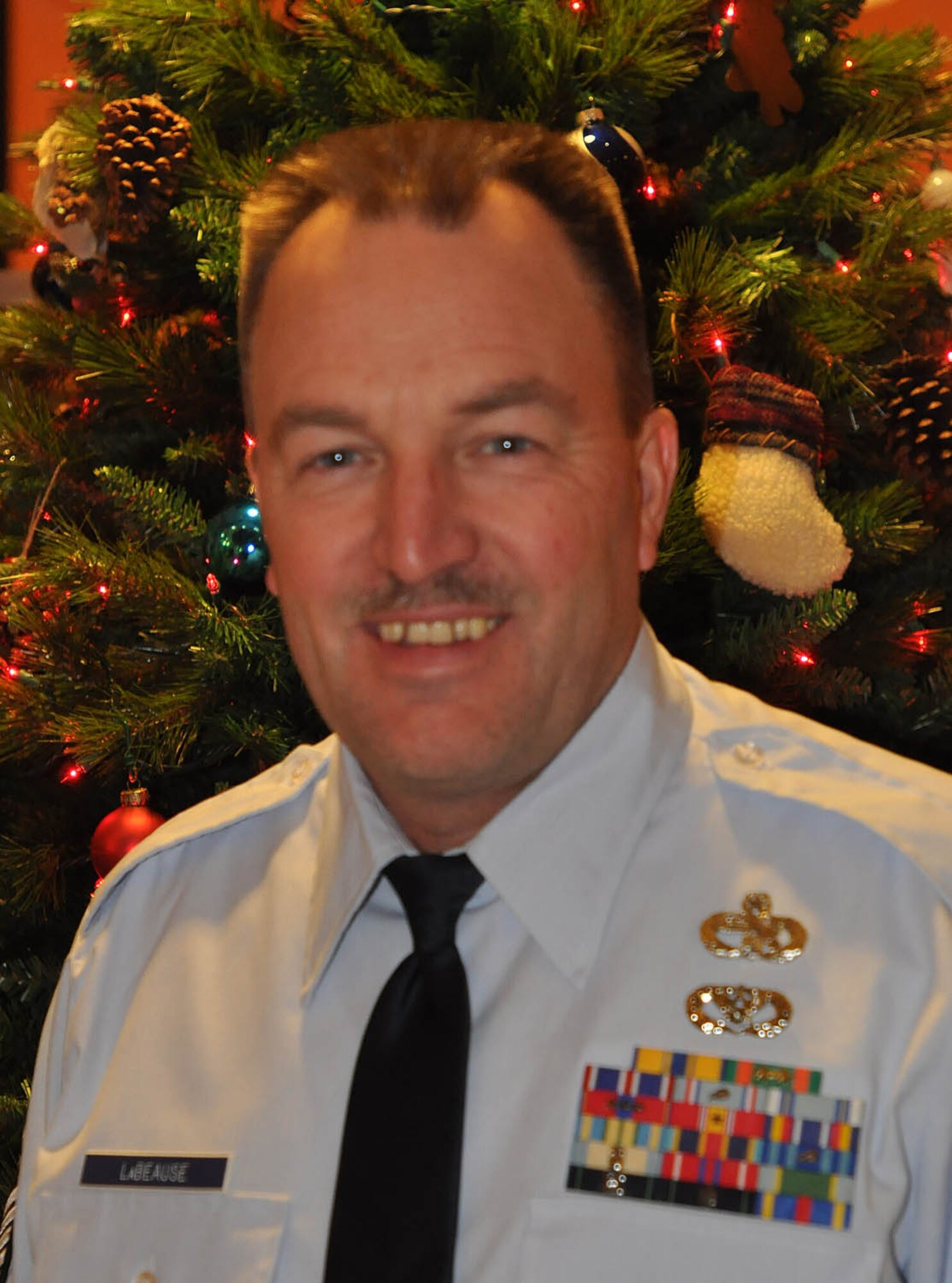 Master Sgt. David Labeause, First Sgt., Force Support Squadron. "Traveling to LaCrosse Wis. To visit family and have a going away party for my son who is going off to Army boot camp. (I know). My favorite holiday tune is Rudolph the Red Nosed Reindeer." (U.S. Air Force photo by Tech Sgt. Bob Sommer)