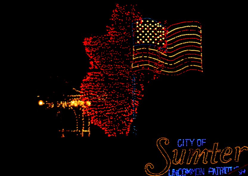 The city of Sumter lights up the town with Fantasy of Lights at Swan Lake's Iris Gardens as the Christmas season nears, Sumter, S.C. Dec. 1, 2011. Swan Lake's Iris Gardens brightened the holiday with more than 1,000,000 lights, and several food vendors for their opening night. (U.S. Air Force photo by Airman 1st Class Ashley L. Gardner/ Released)
 

