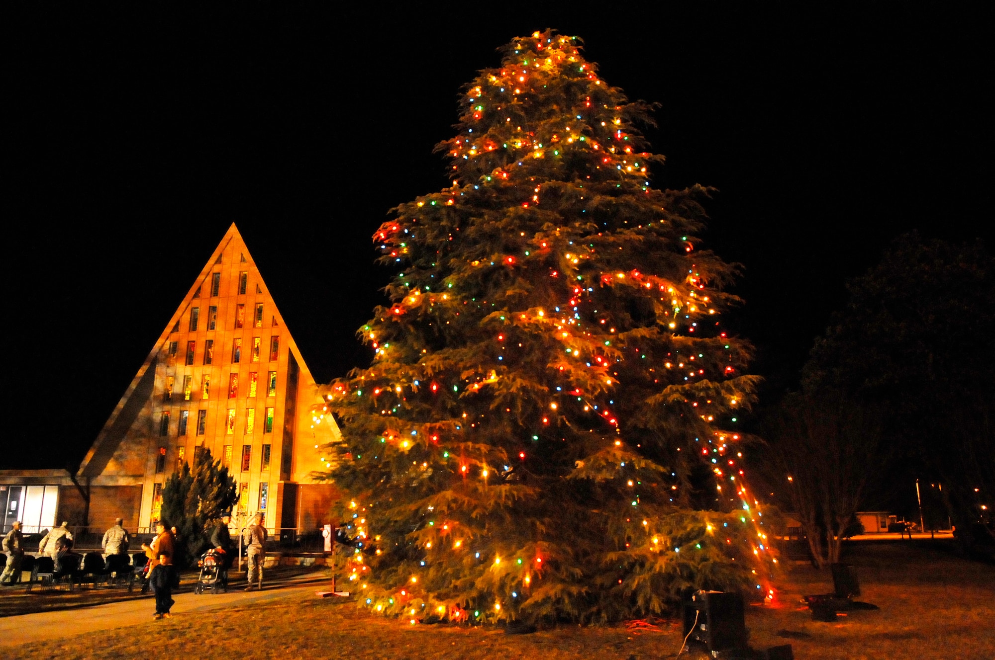 Team Robins members gathered around the tree near the Base Chapel to enjoy Christmas carols, hear stories, visit with Santa and watch the annual lighting of the Christmas tree.