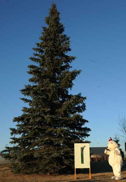 The Grand Forks bear waits for the lighting ceremony to begin on Dec. 1 at Grand Forks Air Force Base, N.D.  Airmen, friends and family members attend the ceremony to kick-start the celebration of the holiday season.  (U.S. Air Force photo by Airman 1st Class Xavier Navarro)