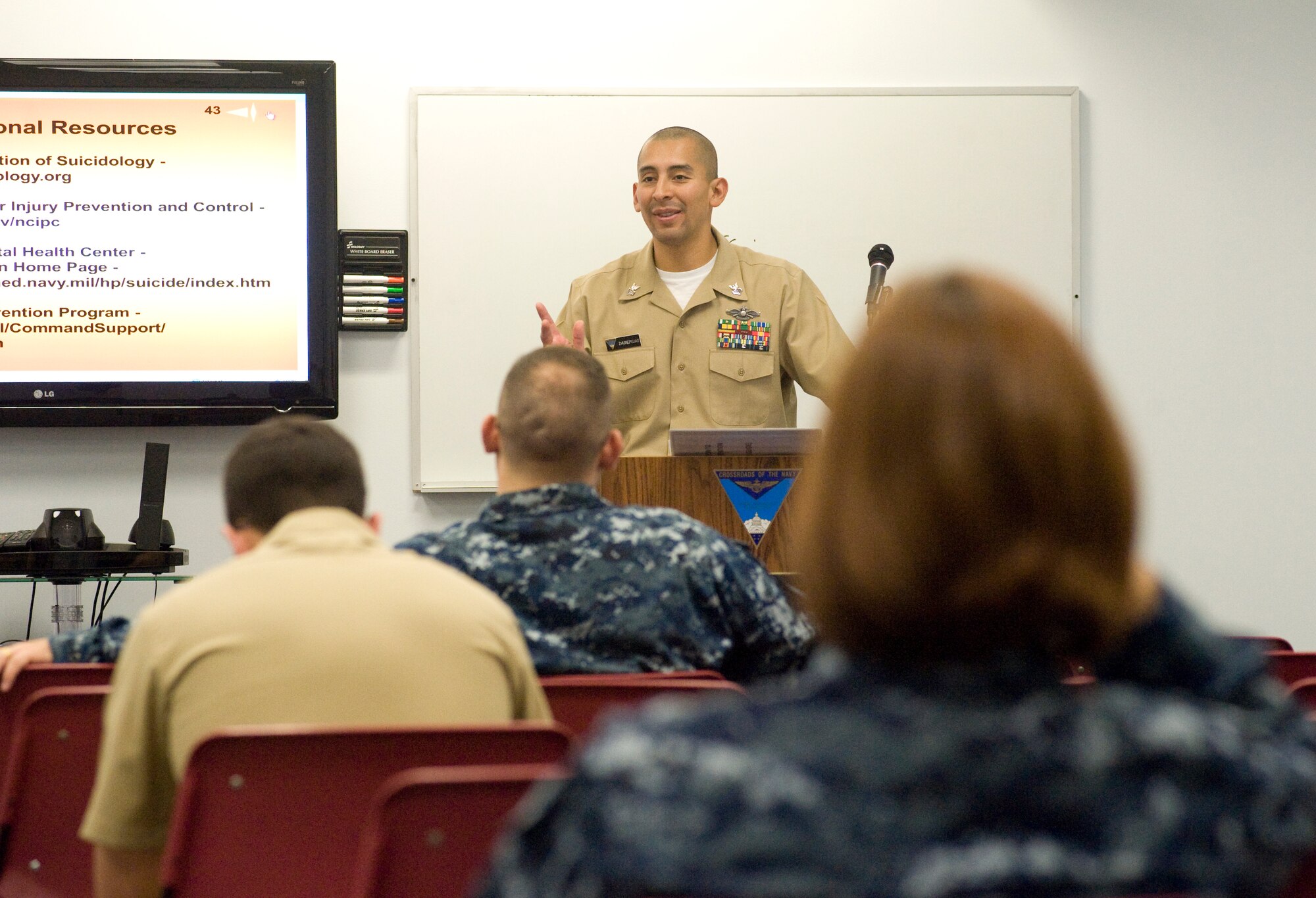 Navy Hospital Corpsman 1st Class Jaime Zhunepluas, Naval Air Facility Washington training and readiness leading petty officer, instructs a suicide prevention class at the Naval Operational Support Center Washington. (Photo/Bobby Jones) 