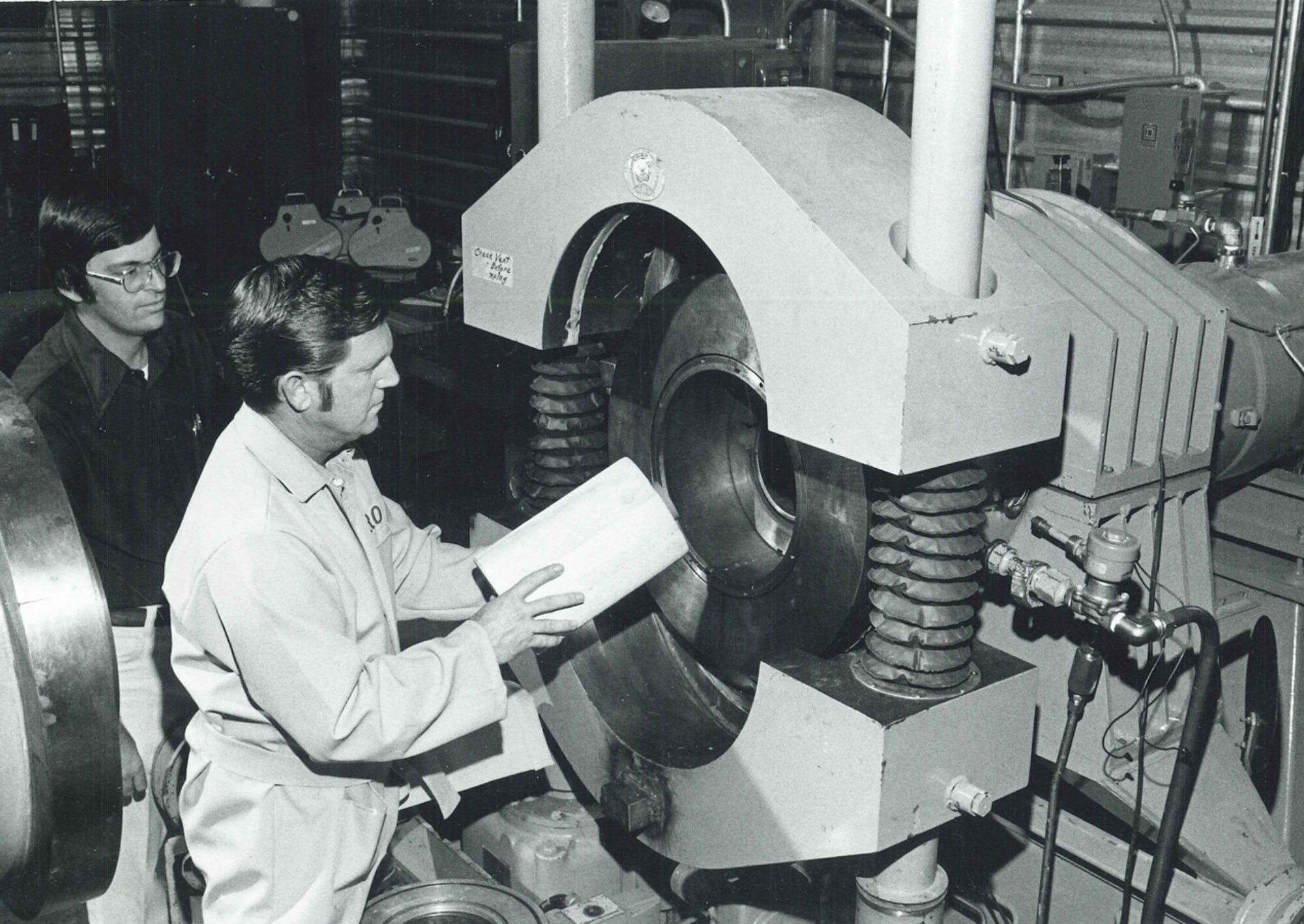 J.Y. Parker and Jim (J.R.) Brown loading Range S-3 (Chicken Gun) in 1976. (Photo provided)