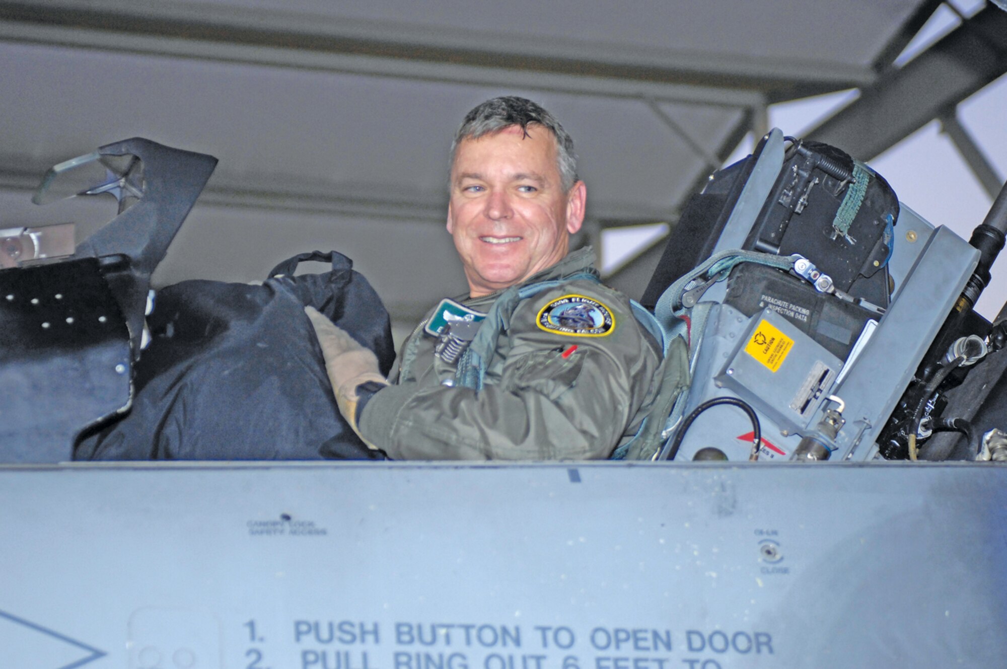 Maj. Elton Davis, 308th Fighter Squadron director of staff, prepares to exit his aircraft after crossing his 3,000 flying hour mark in an F-16 Fighting Falcon Nov. 21 at Luke Air Force Base.  Davis is one of fewer than 250 active-duty pilots to reach this milestone.  (U.S. Air Force photo by Staff Sgt. Jason Colbert)