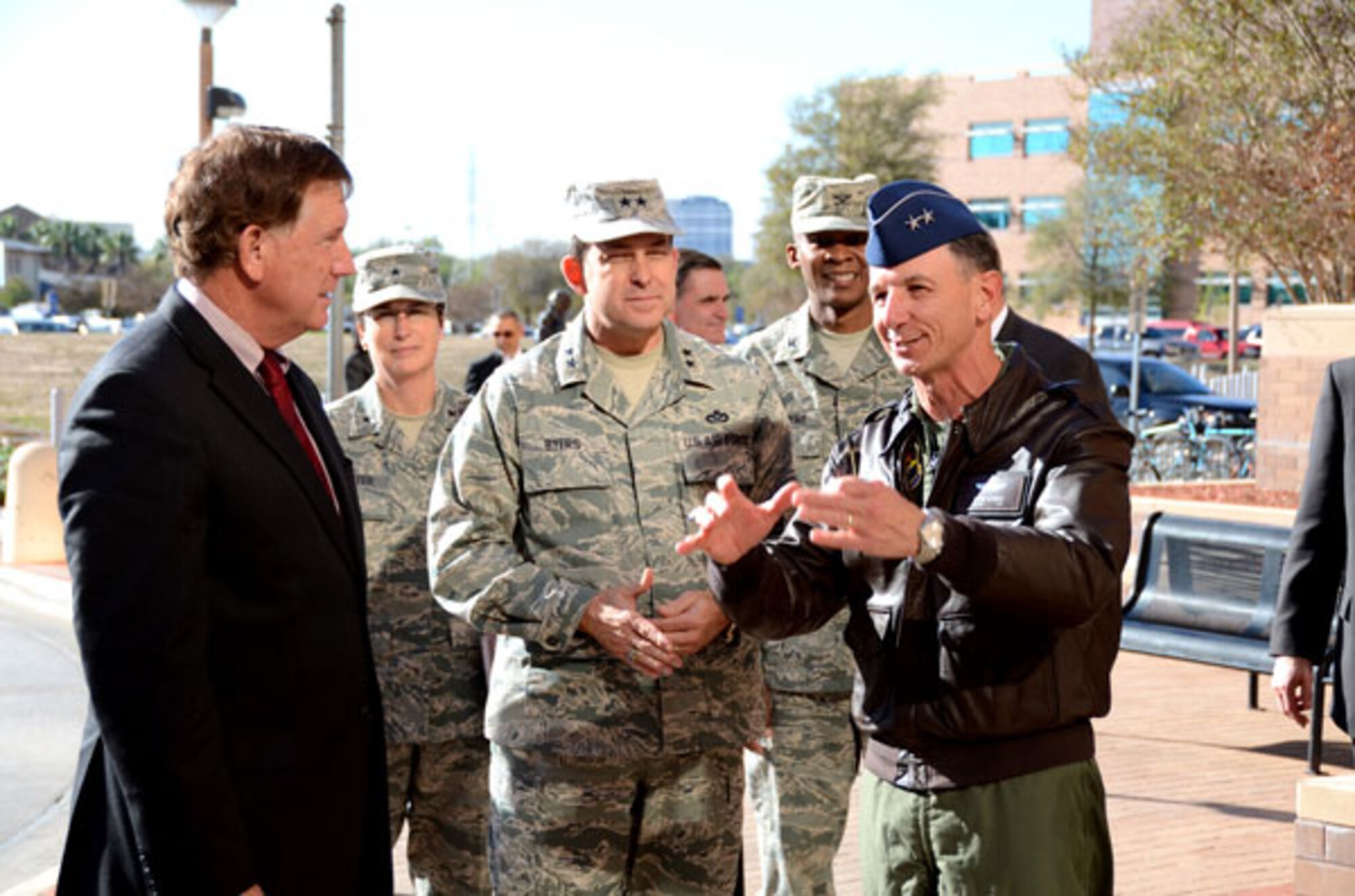 Maj. Gen. (Dr.) Byron C. Hepburn briefs Assistant Secretary of the Air Force Installations, Environment and Logistics Terry Yonkers (left), Brig. Gen. Theresa Carter and Maj. Gen. Timothy Byers, The Air Force Civil Engineer, about state-of-the-art facilities he will see at the Brooke Army Medical Center, which is expanding services under 2005 Base Realignment and Closure requirements. Maj. Gen. Hepburn commands the Air Force's 59th Medical Wing and the Wilford Hall Ambulatory Surgical Center.