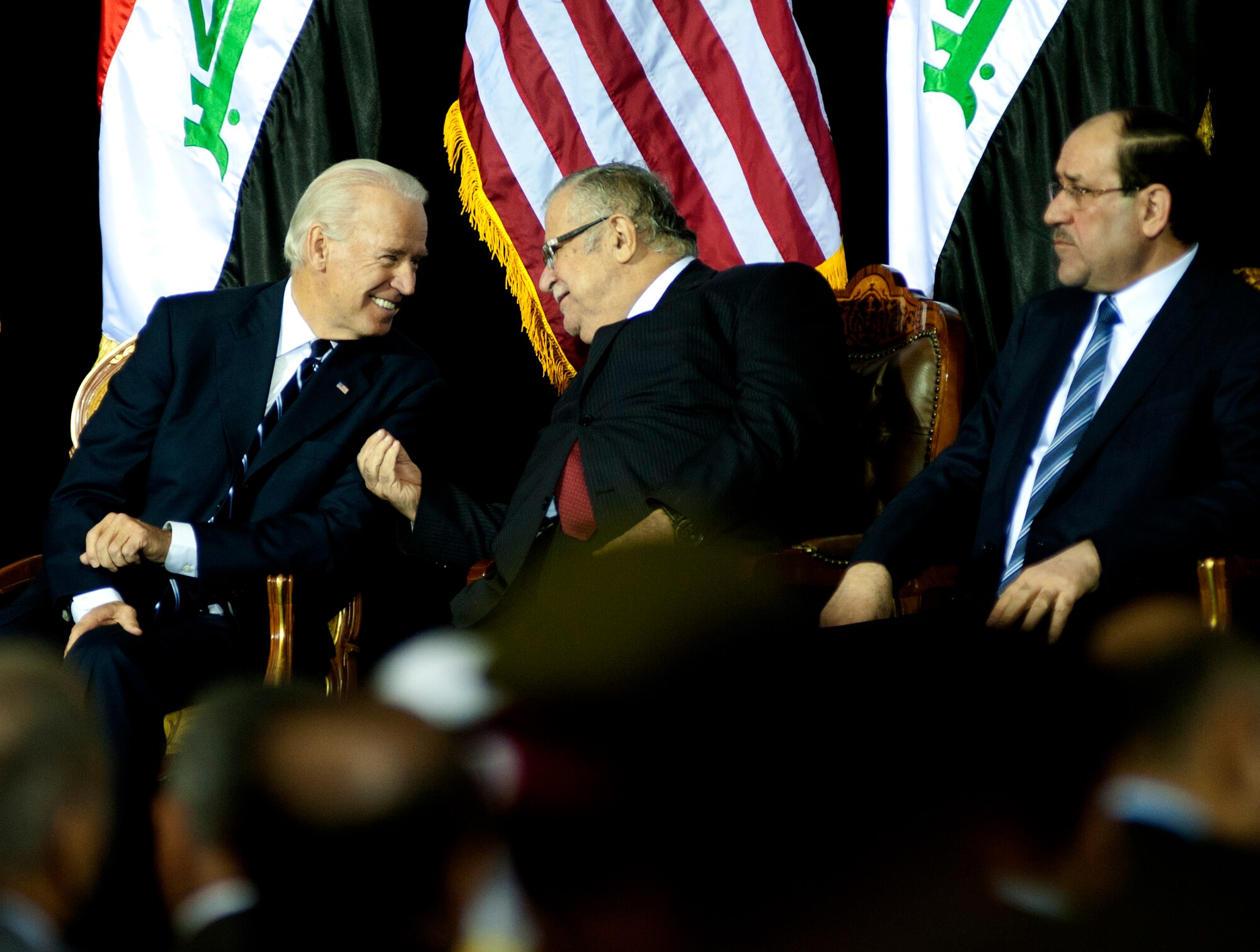 The Vice President of the United States, Joe Biden, talks to the President of Iraq, Jalal Talabani during the  Commitment Day ceremony in the Al Faw Palace at Victory Base Complex, Iraq, on Dec. 1, 2011. The Government of Iraq hosted the ceremony to commemorate the sacrifices and accomplishments of U.S. and Iraqi service members. (U.S. Air Force photo/Master Sgt. Cecilio Ricardo)