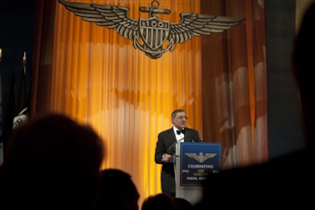 Secretary of Defense Leon E. Panetta delivers the keynote address at the Centennial Commemorative Gala for Naval Aviation at the National Building Museum in Washington D.C., on December 1, 2011.  Panetta spoke of the leadership and valor that naval aviators from the Navy, Marine Corps and Coast Guard have shown over the last 100 years.  