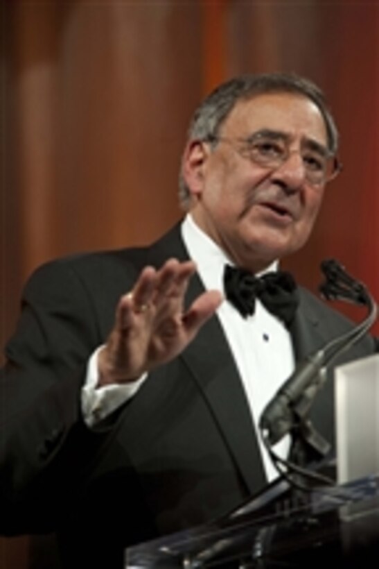 Secretary of Defense Leon E. Panetta delivers the keynote address at the Centennial Commemorative Gala for Naval Aviation at the National Building Museum in Washington D.C., on December 1, 2011.  Panetta spoke of the leadership and valor that naval aviators from the Navy, Marine Corps and Coast Guard have shown over the last 100 years.  