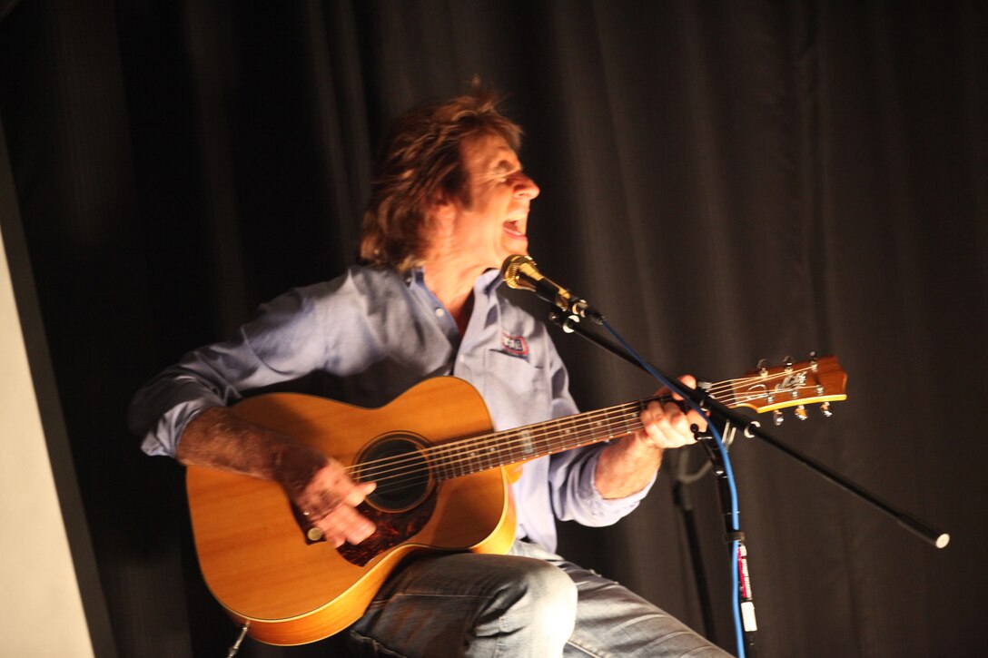 John Parr sings 'A Few Good Men' during his concert at USO of North Carolina-Jacksonville on Dec. 3. The song::r::::n::is about Marines.(Official U.S. Marine Corps photo by Pfc. Jackeline M. Perez Rivera) ::r::::n::::r::::n::