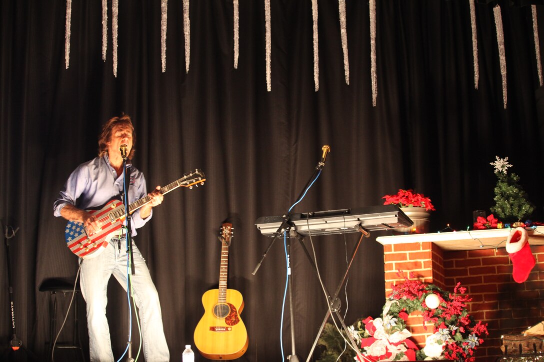 John Parr sings at his concert at USO of North Carolina-Jacksonville on Dec. 3. He sang his popular songs from the::r::::n::'80's along with new tracks from his album Letter to America. (Official U.S. Marine Corps Photo by Pfc. Jackeline M. Perez Rivera) ::r::::n::