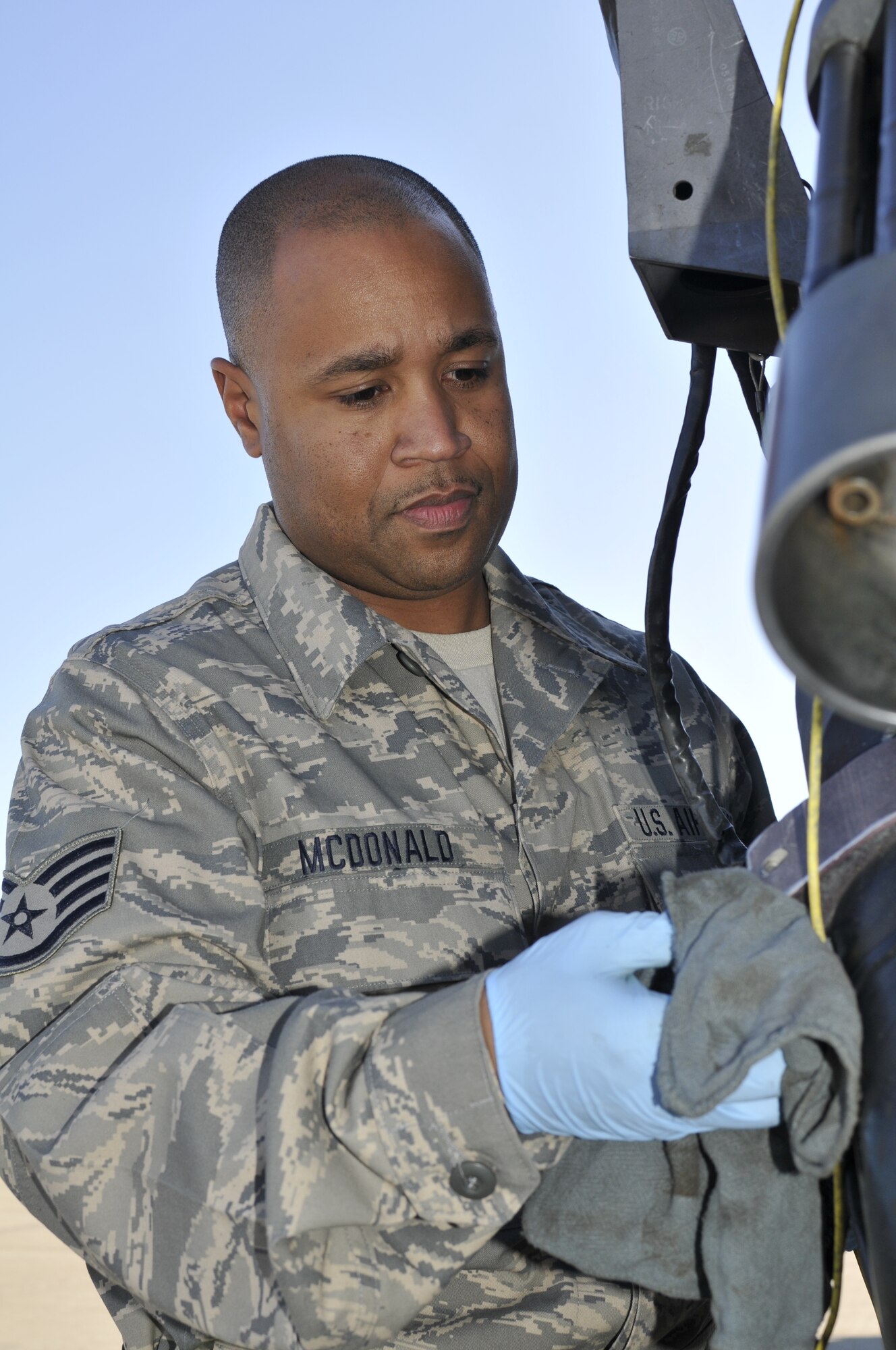 California Air National Guard Staff Sgt. Rodney Moore, the wing
mobility team leader assigned to the 129th Logistics Readiness Squadron,
labels mobility bags in preparation of the first phase of an Air Combat
Command Operational Readiness Inspection at Moffett Federal Airfield, Calif.
Dec. 2, 2011. The Phase I ORI, scheduled for Dec. 3 and 4 at the 129th
Rescue Wing, tests the unit's wartime capabilities and readiness to deploy.
(Air National Guard photo by Staff Sgt. Kim Ramirez) 
