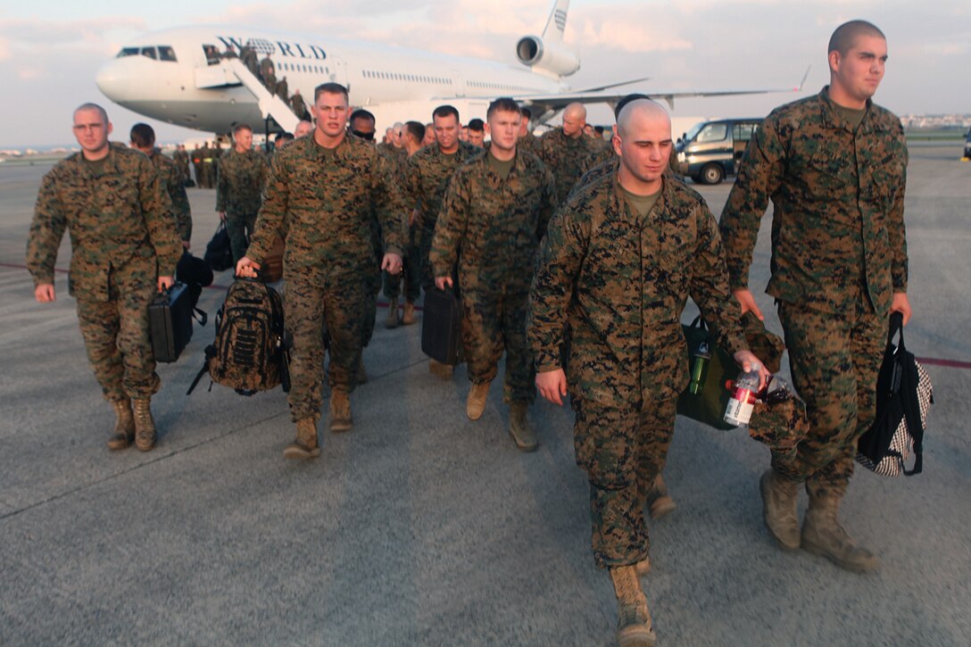 Marines of 1st Battalion, 4th Marine Regiment, arrive from Camp Pendleton, Calif. for deployment with the 31st Marine Expeditionary Unit as the new Battalion Landing Team, Dec. 4.  The battalion has now become the ground combat element of the 31st MEU, and is scheduled to embark aboard ships of Amphibious Squadron 11 for support of Theater Security Cooperation in the Asia-Pacific region. The 31st MEU is America’s force in readiness in the Asia-Pacific region and the only continually forward-deployed MEU.