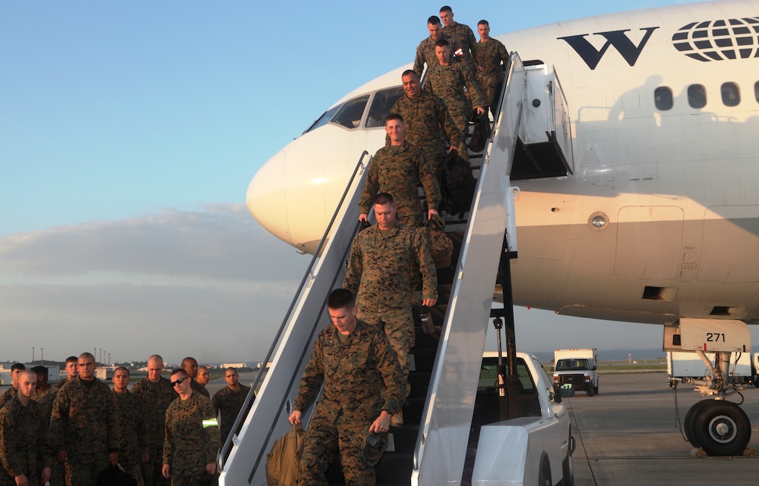 Marines of 1st Battalion, 4th Marine Regiment, arrive from Camp Pendleton, Calif. for deployment with the 31st Marine Expeditionary Unit as the new Battalion Landing Team, Dec. 4.  The battalion has now become the ground combat element of the 31st MEU, and is scheduled to embark aboard ships of Amphibious Squadron 11 for support of Theater Security Cooperation in the Asia-Pacific region. The 31st MEU is America’s force in readiness in the Asia-Pacific region and the only continually forward-deployed MEU.