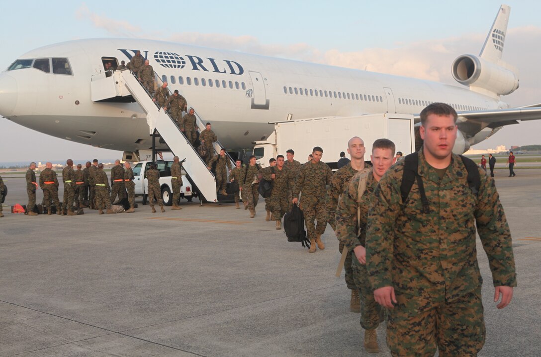 Marines of 1st Battalion, 4th Marine Regiment, arrive from Camp Pendleton, Calif. for deployment with the 31st Marine Expeditionary Unit as the new Battalion Landing Team, Dec. 4.  The battalion has now become the ground combat element of the 31st MEU, and is scheduled to embark aboard ships of Amphibious Squadron 11 for support of Theater Security Cooperation in the Asia-Pacific region. The 31st MEU is America’s force in readiness in the Asia-Pacific region and the only continually forward-deployed MEU.