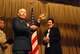 Col. Wayne Olson, 433rd Aeromedical Evacuation Squadron commander, inducts retired Air Force colonel Regina Aune as an honorary commander during the December 2011 unit training assembly, Lackland Air Force Base, Texas.  (U.S. Air Force photo/Senior Airman Brian McGloin)