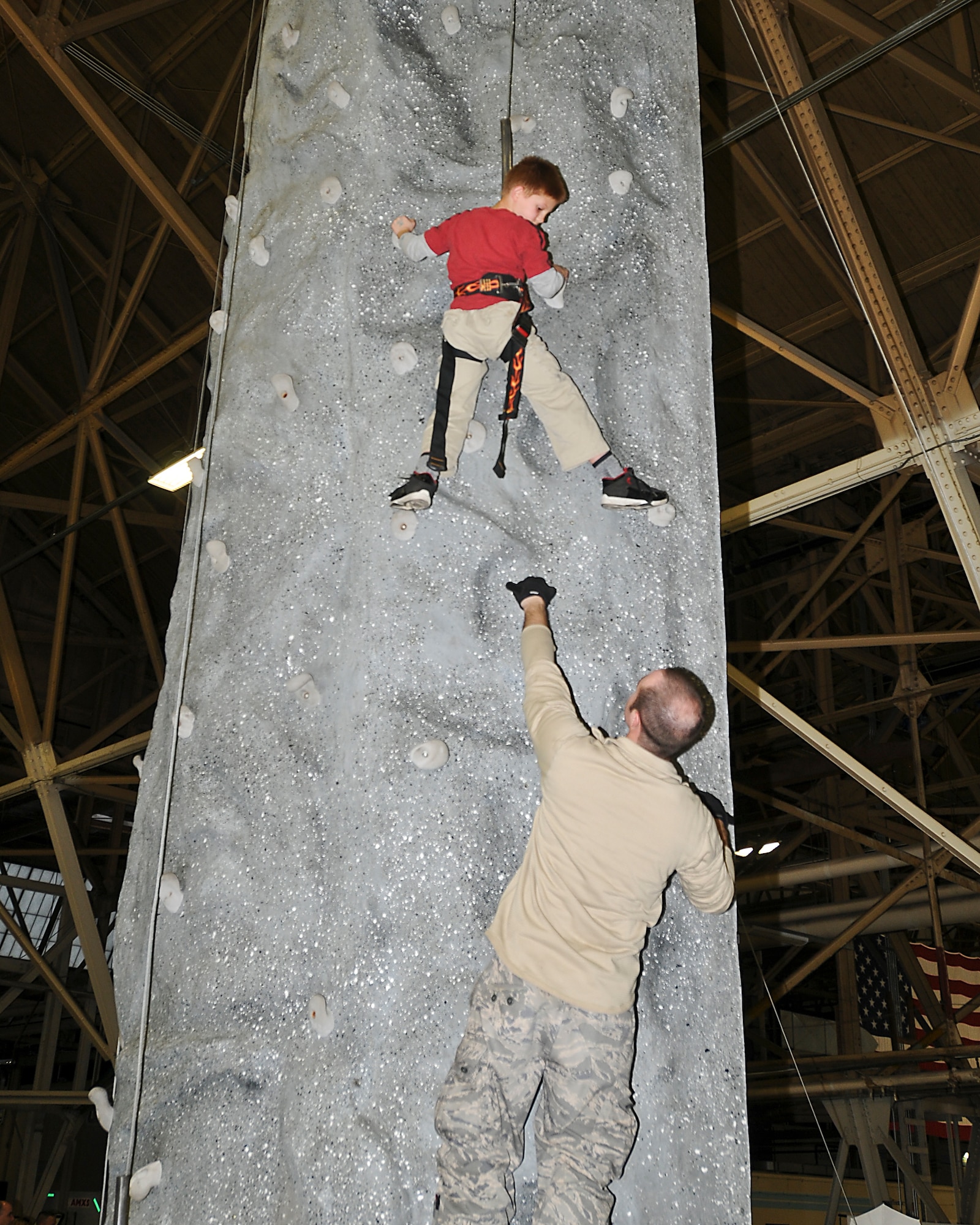 141st Air Refueling Wing members and their families enjoyed festivities at the annual Christmas party in Hanger 2050, Fairchild Air Force Base, Wash. on Dec. 3, 2011. (U.S. Air Force photos by Master Sgt Mindy Gagne)