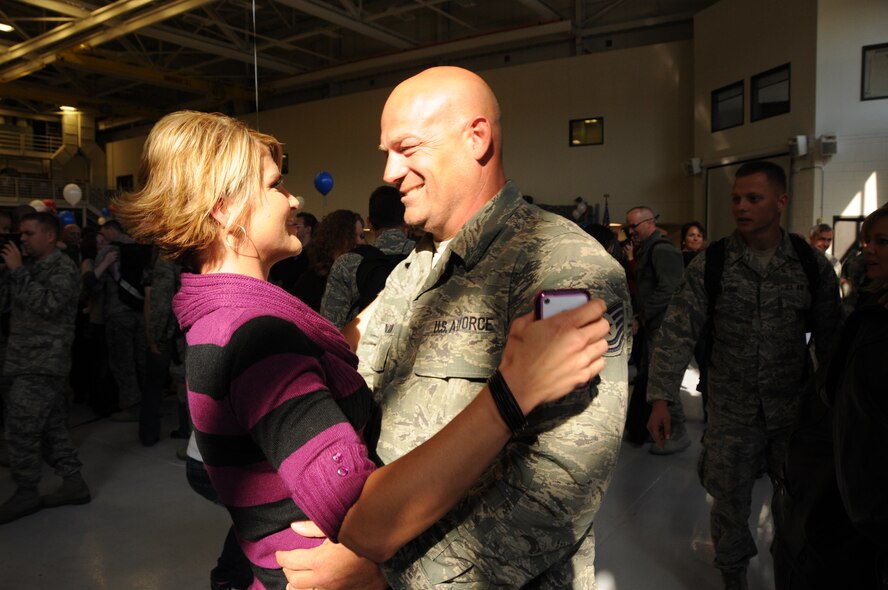 Members of the 134th Air Control Squadron returned home to McConnell Air Force Base, Kansas after a four month deployment to South West Asia. The airmen were greeted by hundreds of family, friends, and coworkers on November 18, 2011.