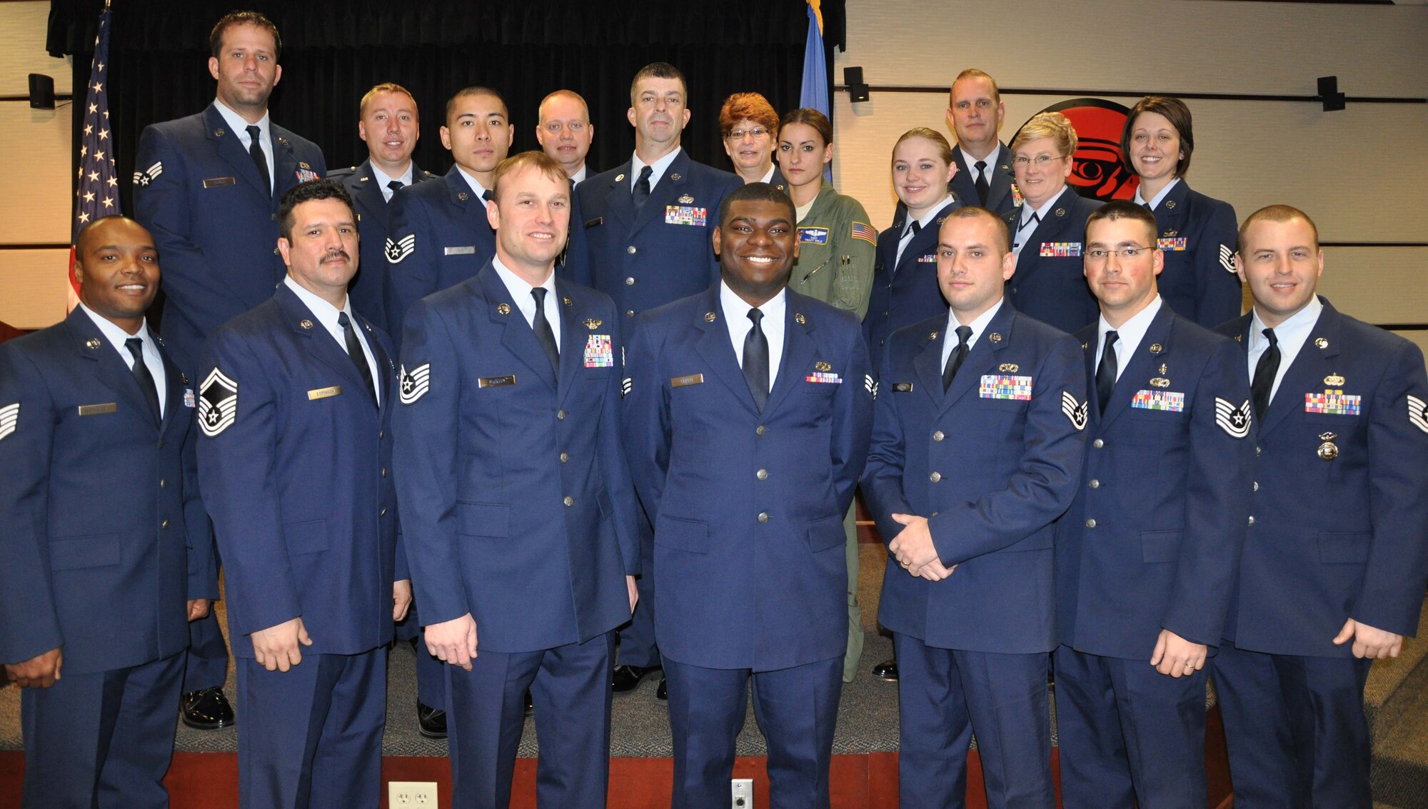 Thirteen members of the 931st Air Refueling Group were awarded an Associate in Applied Science Degree from the Community College of the Air Force during a graduation ceremony at McConnell Air Force Base, Kan., Dec. 4.  (U.S. Air Force photo by 1st Lt. Zach Anderson)