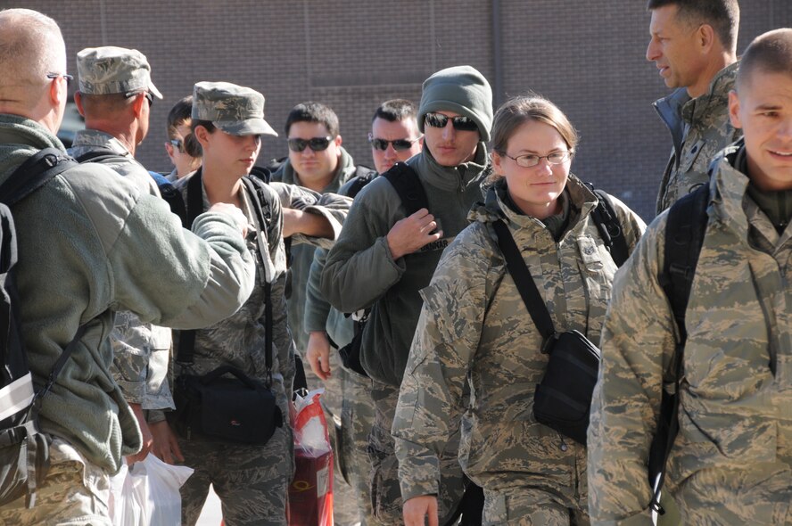 Members of the 134th Air Control Squadron returned home to McConnell Air Force Base, Kansas after a four month deployment to South West Asia. The airmen were greeted by hundreds of family, friends, and coworkers on November 18, 2011.