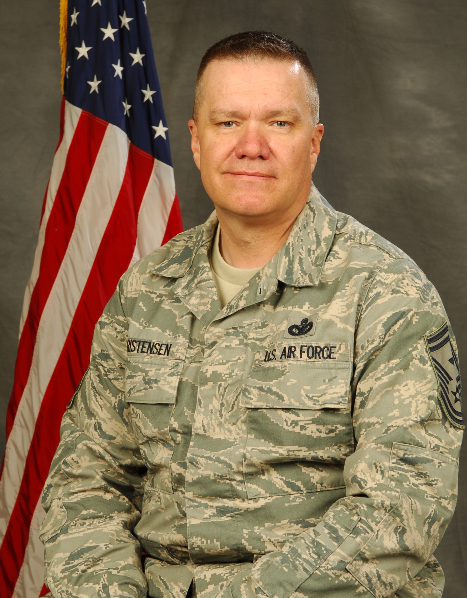 Senior Master Sgt. Dwight Christensen, 151st Air Refueling Wing first sergeant, poses for an official photo before his deployment to Iraq. U.S. Air Force photo by Tech. Sgt. Kelly Collett (RELEASED)