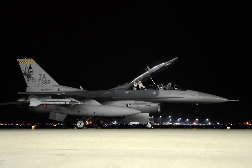 After a visit to the 132nd Fighter Wing's (132FW) 2011 Holiday Party, Santa Claus departs via F-16 aircraft to continue preparations for the holidays.  The Holiday Party was held in the hangar of the 132FW, Des Moines, Iowa on December 2, 2011.  (National Guard photo/Staff Sgt. Linda E. Kephart)(Released)