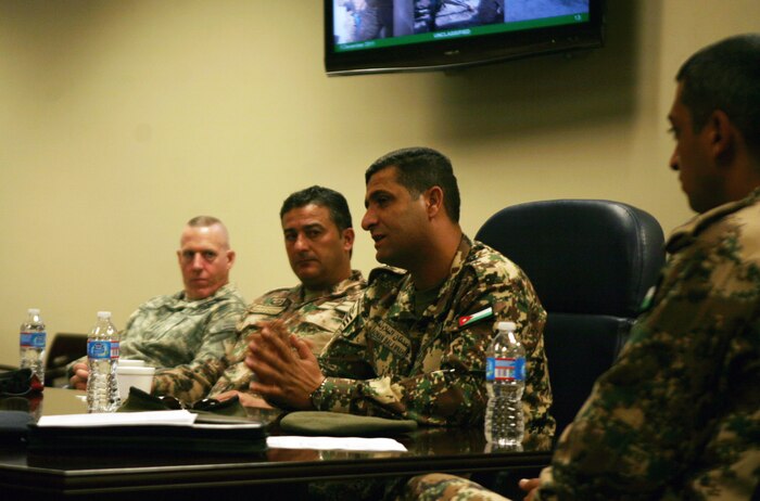 Sgt. Maj. Adnan Balawnah, the sergeant major of the Jordanian army, asks a question during a tour of the School of Infantry East aboard Camp Geiger, N.C., Dec. 5, 2011. During the tour, senior enlisted leaders from the Jordanian military were walked through classes and demonstrations regularly taught at Infantry Training Battalion, SOI East. (U.S. Marine Corps photo by Pfc. Franklin E. Mercado)