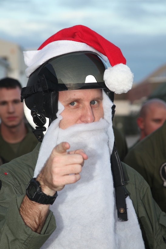 Capt. Matthew “C.L.O.W.N.” Krivohlavy, a pilot for Marine Attack Squadron 231, puts on his game face before the squadron’s Christmas-themed Feats of Strength competition in front of their hangar Dec. 5