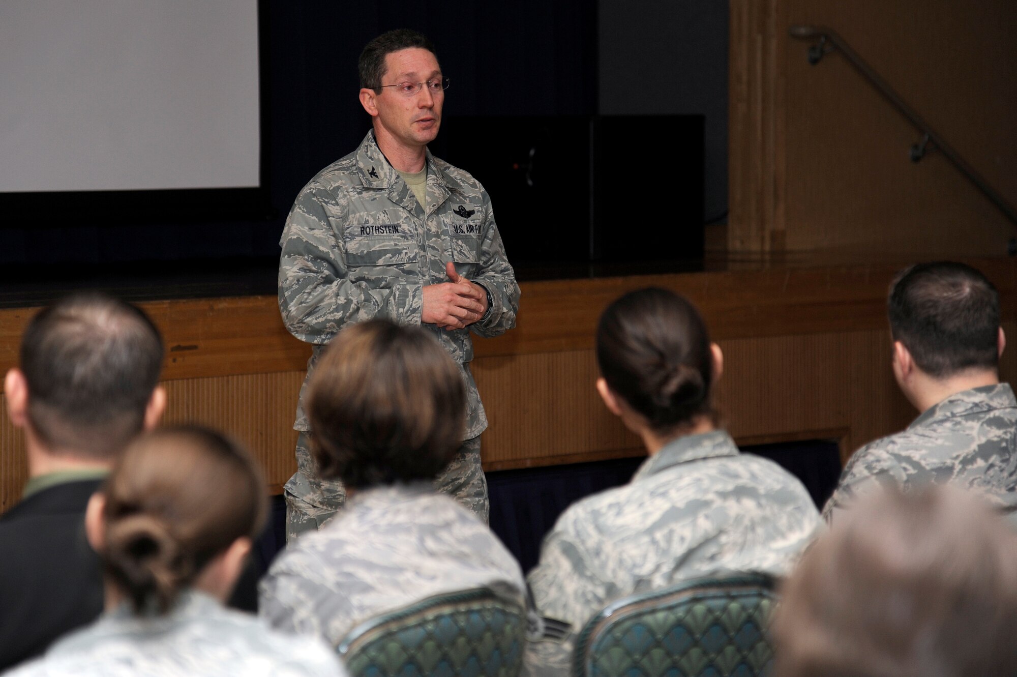 MISAWA AIR BASE, Japan - Col. Michael Rothstein, 35th Fighter Wing commander, gives closing remarks during a mock town hall meeting of an operational readiness inspection here Dec. 6. Town Hall meetings are held to inform dependents of base services available to them and to update them on current situations. Members of the 35th Fighter Wing are currently going through an ORI to test airmen's war fighting capabilities. (U.S. Air Force photo/Tech. Sgt. Marie Brown)
