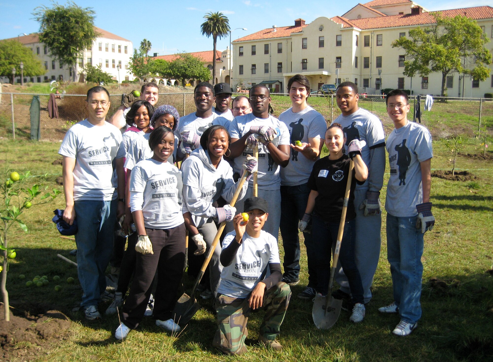 Celebrating the project's success, volunteers from Team Edwards and actor, Brandon Routh, known for his role in the 2006 film, "Superman Returns," pose for this photo. THe entire group spent Veterans Day planting orange trees for veterans. (Courtesy Photo)