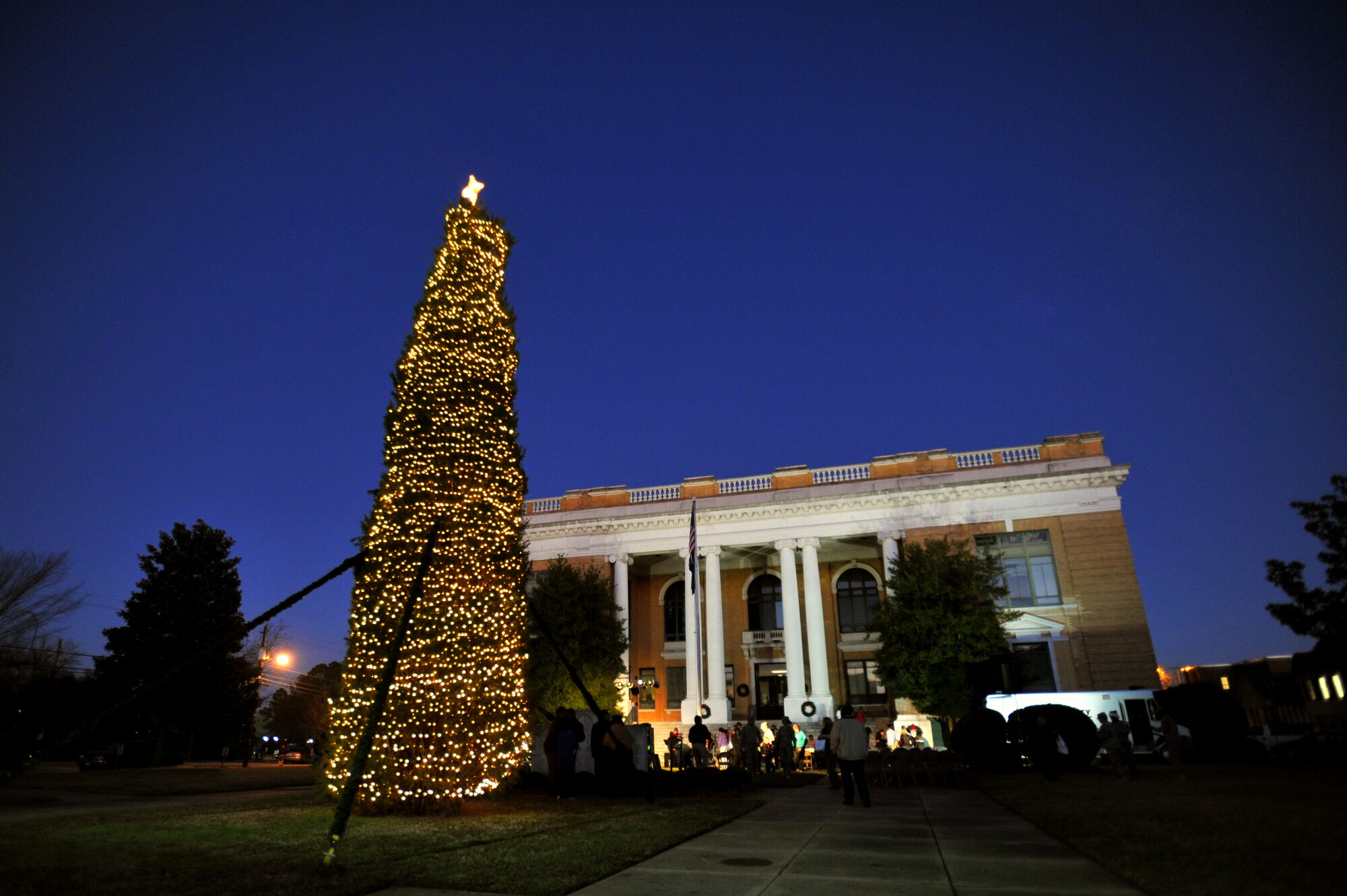 The Sumter Christmas tree illuminates the Sumter County Courthouse after being lit for the first time this year Sumter's Christmas Tree Lighting Ceremony, Dec. 2, 2011, Sumter, S.C. The annual ceremony brought out the holiday spirit as several elementary school choirs performed Christmas carols for those who gathered at the courthouse to witness the celebration. (U.S. Air Force photo by Senior Airman Kenny Holston/Released)


