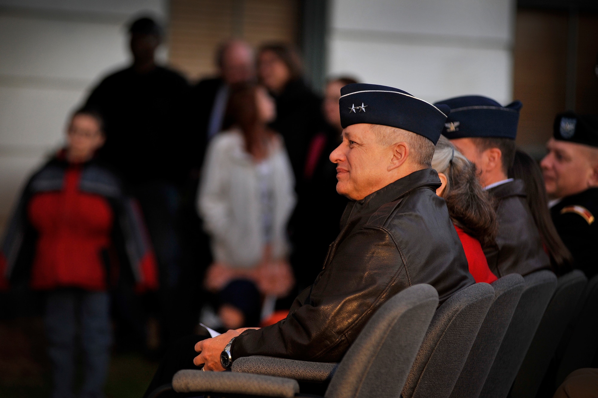 U.S. Air Force Maj. Gen. Lawrence Wells, 9th Air Force commander, watches several Sumter elementary schools' choirs perform while in attendance at Sumter's Christmas Tree Lighting Ceremony, Dec. 2, 2011, Sumter, S.C. The annual ceremony brought out the holiday spirit as several elementary school choirs performed Christmas carols for those who gathered at the courthouse to witness the celebration. (U.S. Air Force photo by Senior Airman Kenny Holston/Released)


