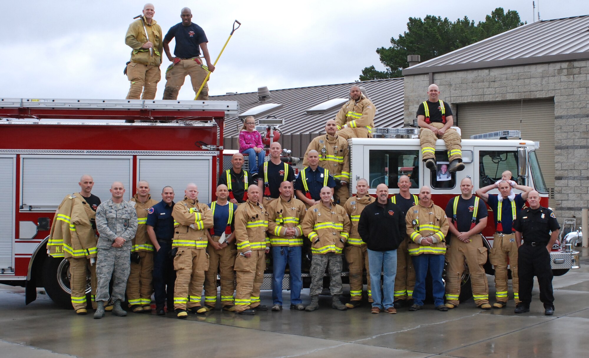 VANDENBERG AIR FORCE BASE, Calif. – Members from the Vandenberg Fire Department pose for a group picture after shaving their heads in honor of Ryan Raffel, the 5-year-old nephew of Vandenberg Fire Department firefighter Robert Raffel, here Sunday, Nov. 20, 2011. Ryan was diagnosed with leukemia earlier this year. (Courtesy photo)