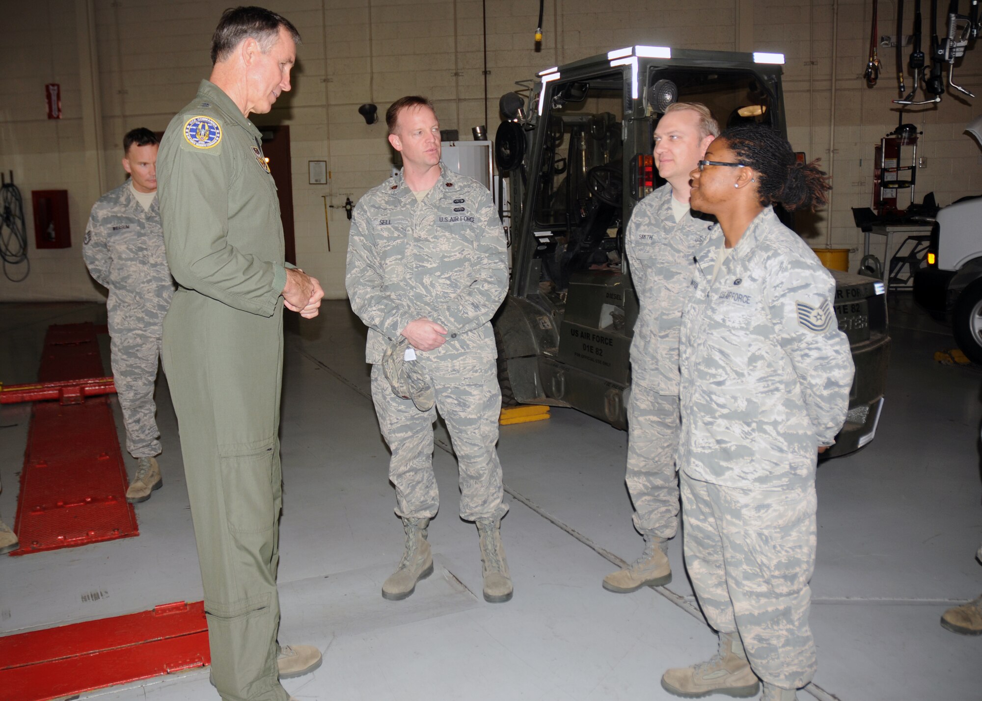 Maj. Gen. Craig N. Gourley, vice commander of Air Force Reserve Command, learns about the 944th Force Support Squadron as he talks with Maj. Lonnie Sell, 944th FSS commander, Master Sgt. James Smith, 944th FSS, Education and Training chief, and Tech Sgt Camille Benton, 944th FSS, Career Development chief, during his recent visit to the 944th Fighter Wing.   (U.S. Air Force photo/Staff Sgt. Louis Vega Jr.)