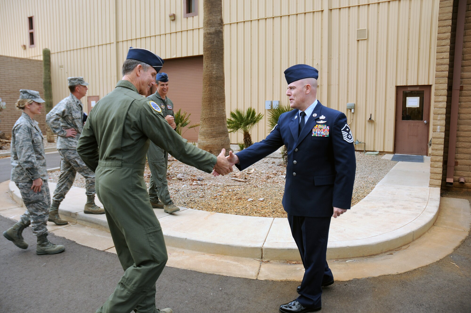 Maj. Gen. Craig N. Gourley, vice commander of Air Force Reserve Command, is greeted by Master Sgt  Todd Morrow, 944th Aeromedical Staging Squadron first sergeant, during his recent visit to the 944th Fighter Wing.  Gourley used his few hours at Luke AFB to visit several 944th organizations and facilities.  During his tour Gourley spoke with Airmen from the Mission Support Group, Aeromedical Staging Squadron and the Operations Group.  (U.S. Air Force photo/Staff Sgt. Louis Vega Jr.)